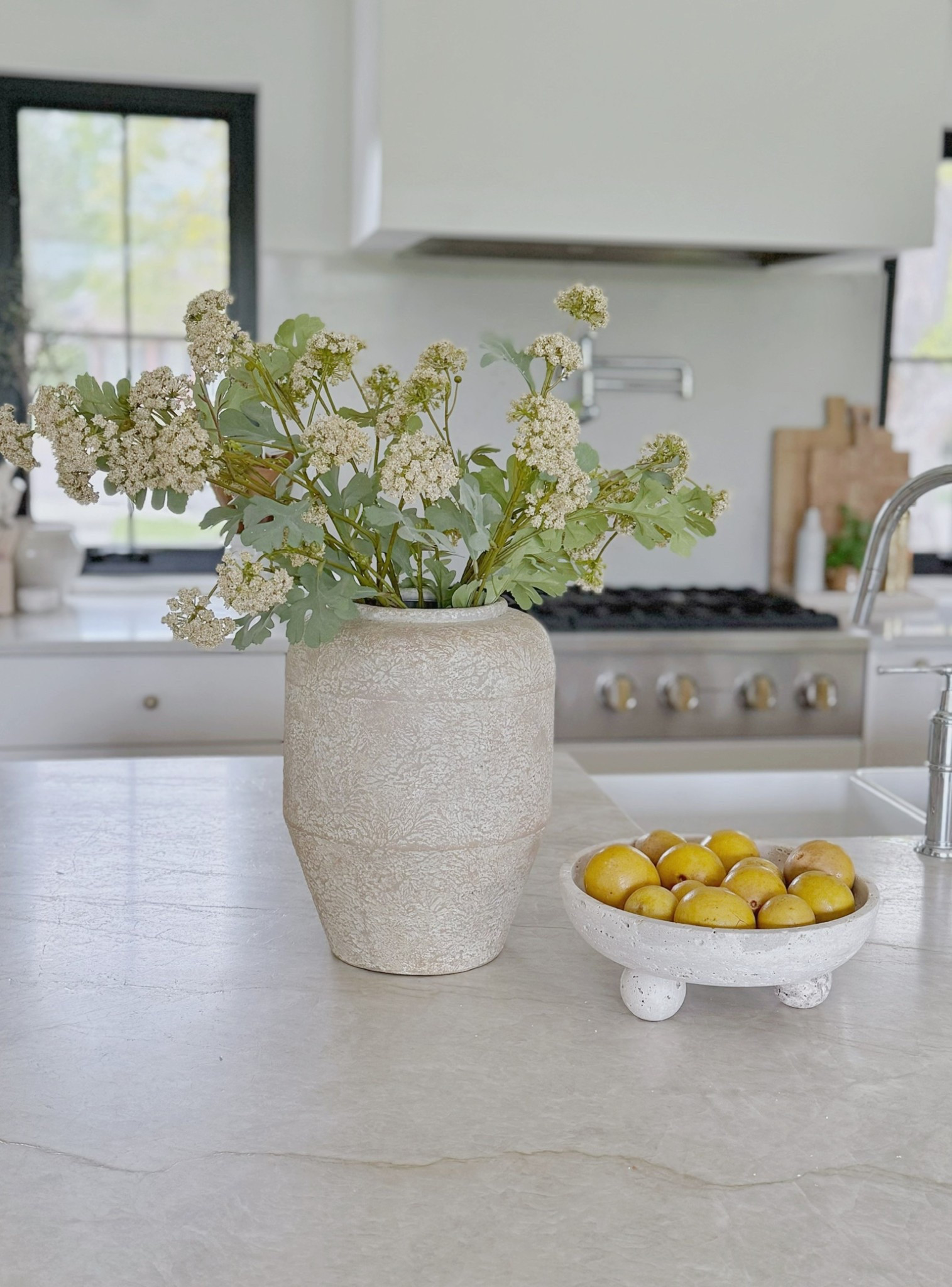 Soft neutrals, fresh stems, and a pop of sunshine from a bowl of lemons—elevated simplicity at its finest!

#LTKHome #LTKStyleTip #LTKSeasonal