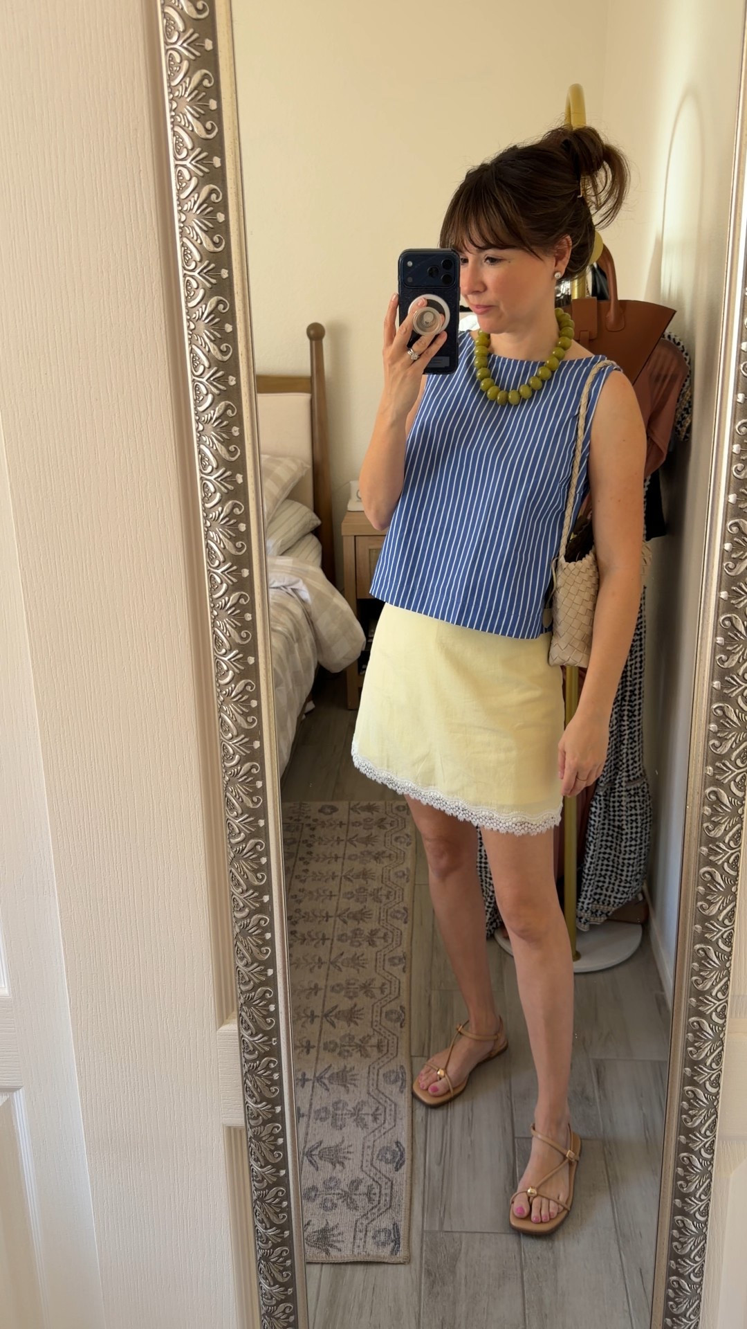 One of my favorite petite summer combos: soft yellow + classic blue stripe.

The structured sleeveless top keeps the look polished, and this mini length works beautifully if you’re under 5’3. I love that it feels feminine but still easy enough for everyday errands or a casual dinner.

Pieces I can mix and rewear always win.

petite summer style, 5’2 styling tips, striped sleeveless top, yellow mini skirt outfit



#LTKootd #LTKPetite