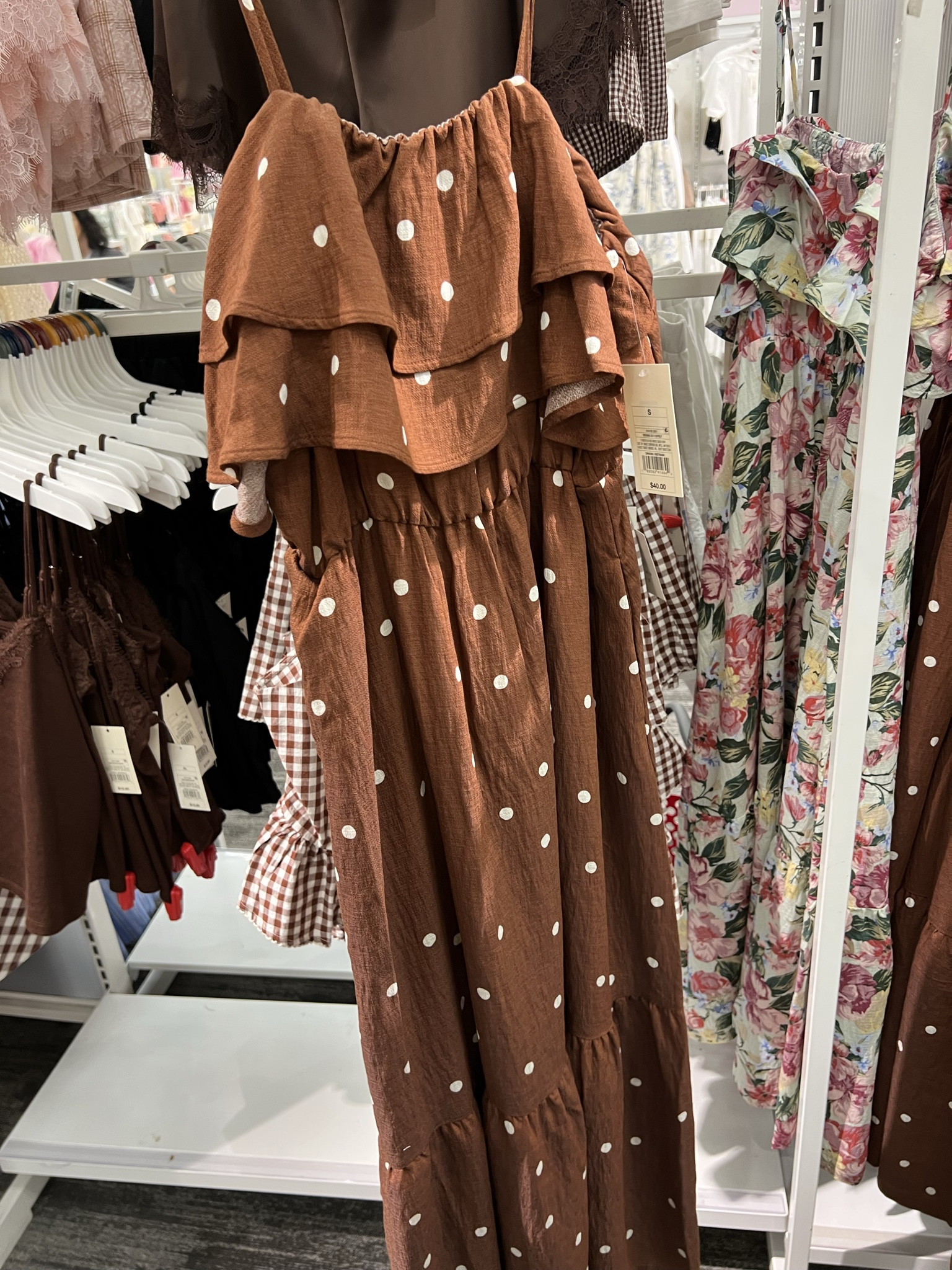Target sleeveless ruffle maxi a-line dress in brown polka dot; also comes in black or pink floral. 

#LTKSaleAlert