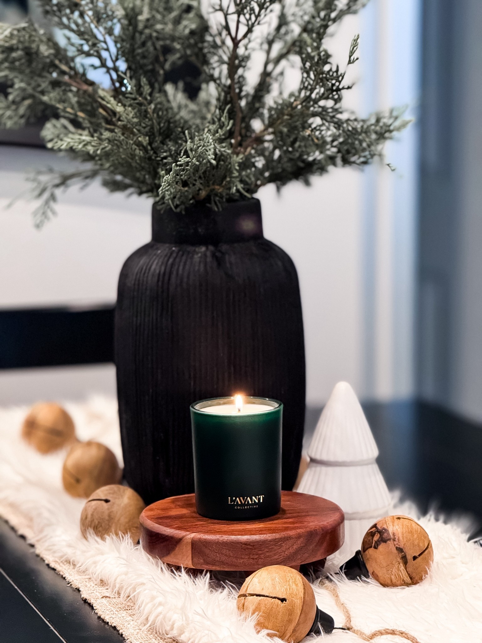 Candles from L’avant Collective are the definition of elevated, cozy minimalism. The vessel itself is so beautiful it doubles as decor even after the candle is finished, making it a thoughtful host gift, stocking stuffer, or everyday luxury for your own home.

The minimalist design pairs beautifully with neutral, modern farmhouse, Scandinavian, and transitional spaces. It looks stunning styled on a wood pedestal or riser, layered with natural elements such as greenery, bells, and soft textiles. Whether placed on a coffee table, bathroom counter, nightstand, or entryway console, it instantly adds warmth and intention to your space.

How to decorate with it:
• Style it on a small wood riser or stack of neutral books to add height and dimension.
• Surround it with natural textures like wood bead garland, jingle bells, or pine greenery.
• Pair with a black or ceramic vase and winter stems for a balanced vignette.
• Add a soft faux fur or linen runner underneath for cozy contrast.
• Use in groups of 2–3 candles (varying heights) for an elevated, layered look.

Holiday decor • shelf styling • minimalist Christmas • cozy winter nights • gifting • bathroom refreshes • neutral home aesthetics • Lavant Collective • Luxury Candle • Minimalist Home • Neutral Home Decor • Winter Home Decor • Elevated Living • Aesthetic Home • Coffee Table Decor #WinterDecorIdeas • Entryway Decor • Gift Ideas For Her • Hostess Gift • Stocking Stuffer Ideas • Simple Luxury 

#LTKGiftGuide #LTKHome #LTKFindsUnder100