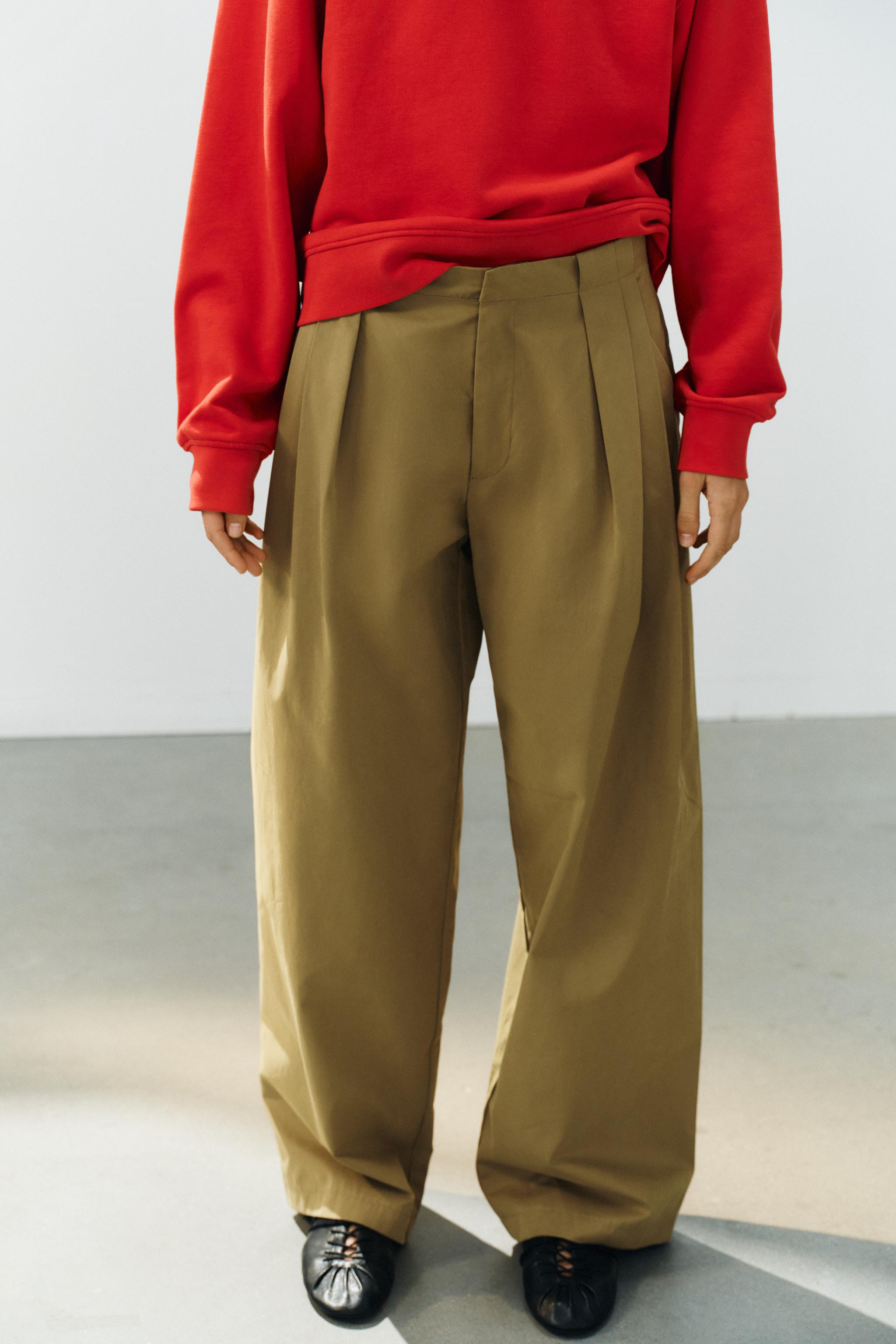 Mid-rise trousers. Side pockets and back faux welt pockets. Features front pleat details. Front c... | Zara US