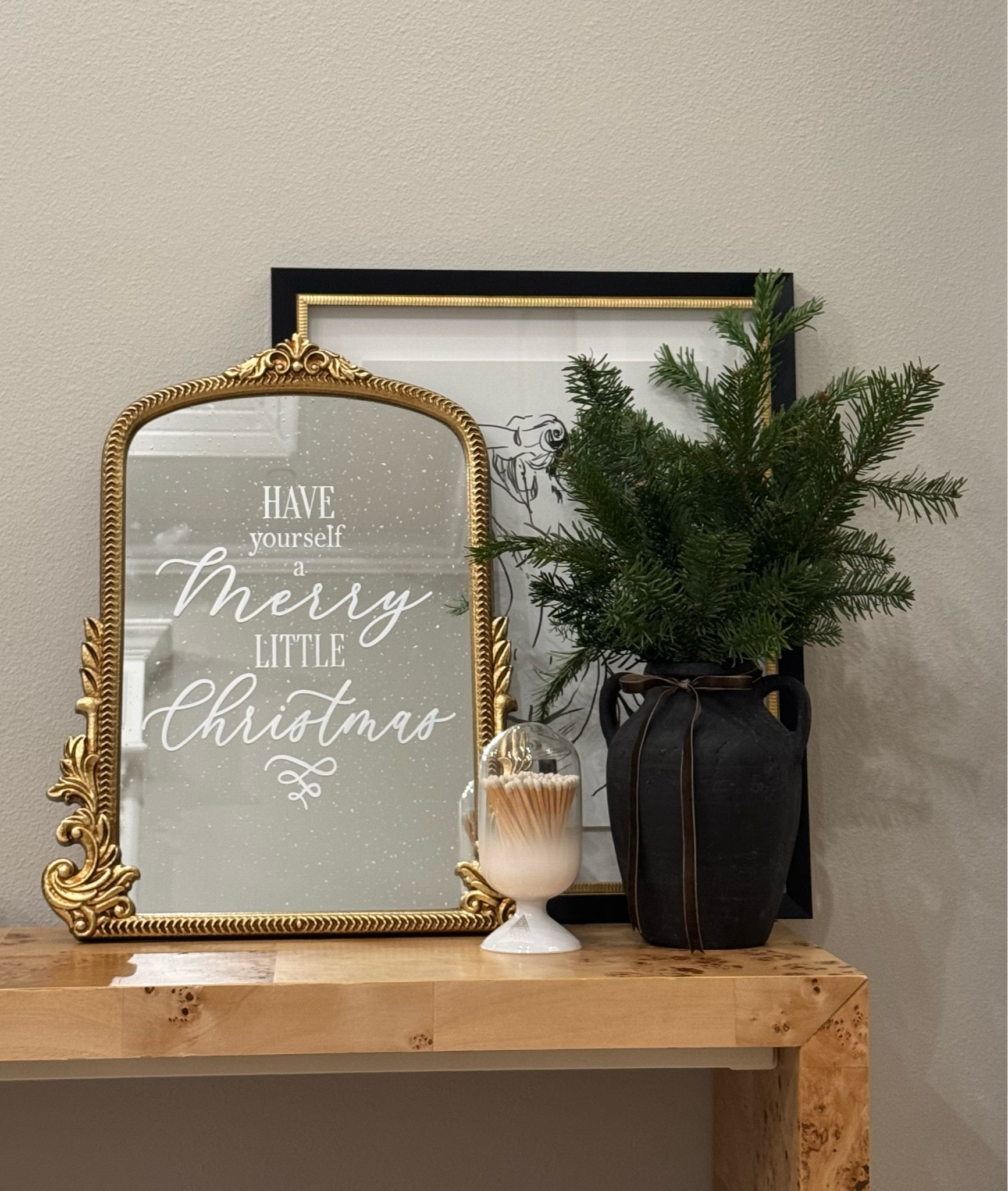 simple and elegant holiday vibes ✨🎄 loving this festive setup with a vintage-inspired mirror (from hobby lobby), evergreen sprigs, and cozy neutral accents! #HolidayDecor #ChristmasHomeDecor #MerryLittleChristmas #FestiveVibes

#LTKSeasonal #LTKHome #LTKHoliday