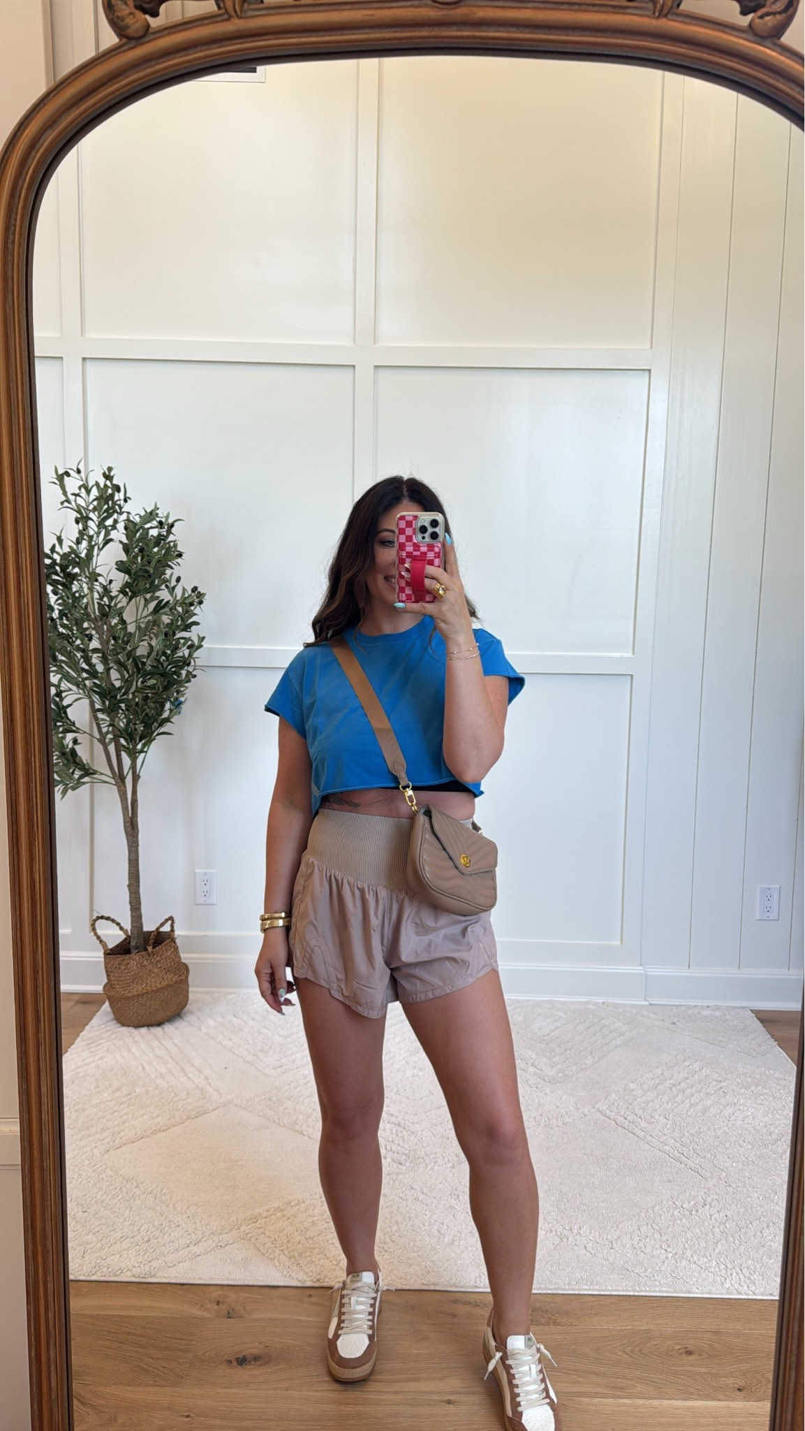 An elevated casual look 🤎💙 The neutral shorts and crossbody make this sporty outfit feel so put together while still being insanely comfy 👏 Perfect for busy days on the go! 

#LTKStyle #CasualChic #MomOutfit #SummerFashion #OOTD #AthleisureLook

#LTKmomlife #LTKootd #LTKdayinmylife