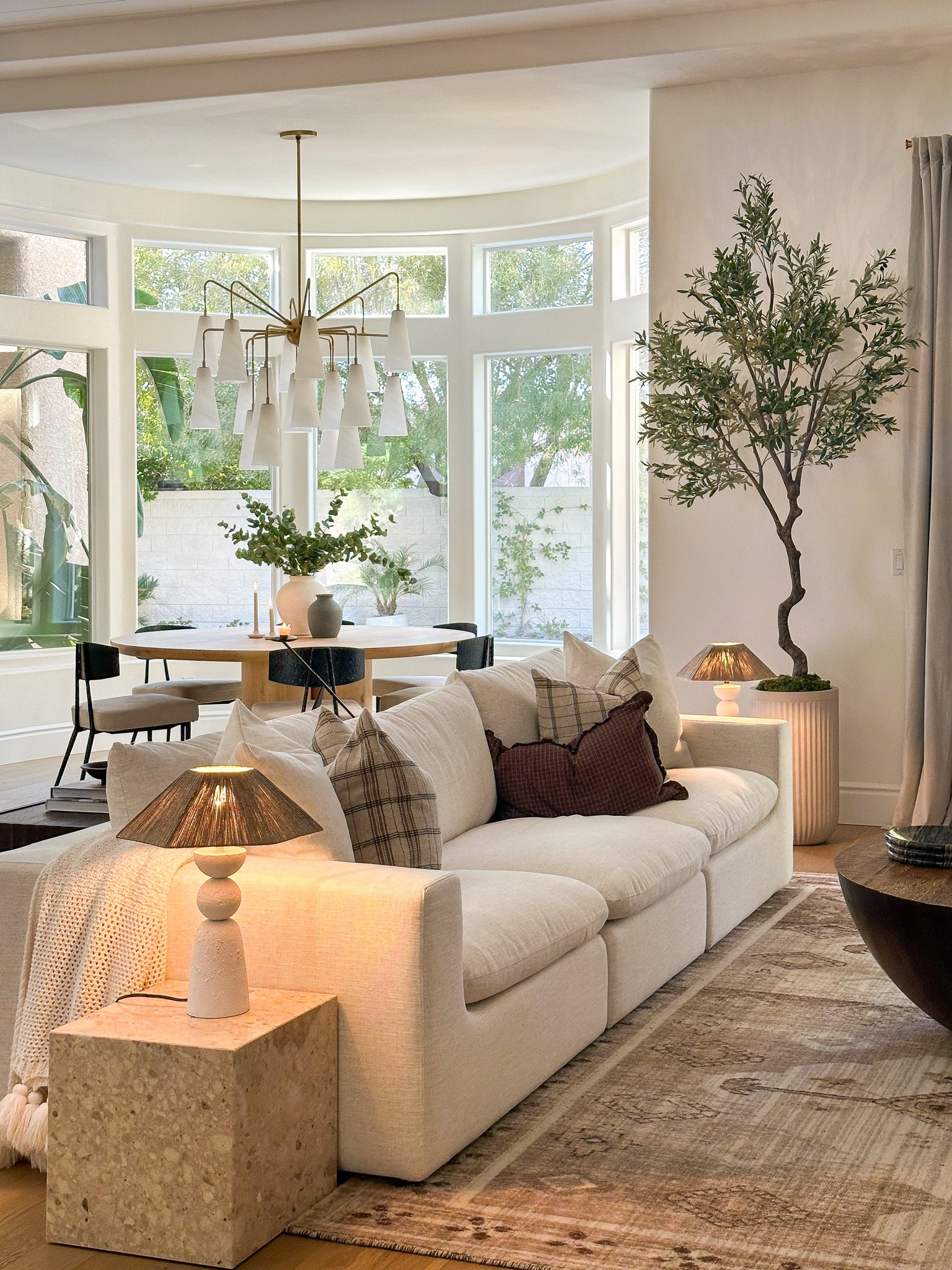 Living room 

Tree, sofa, couch, lamps, rug, chandelier 

#LTKhome #LTKfamily #LTKstyletip