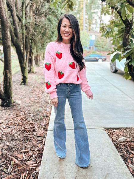 Strawberry sweater 
Cute for Valentine’s Day!
These flare jeans are so affordable and fit TTS

#LTKSeasonal #LTKMostLoved #LTKfindsunder50