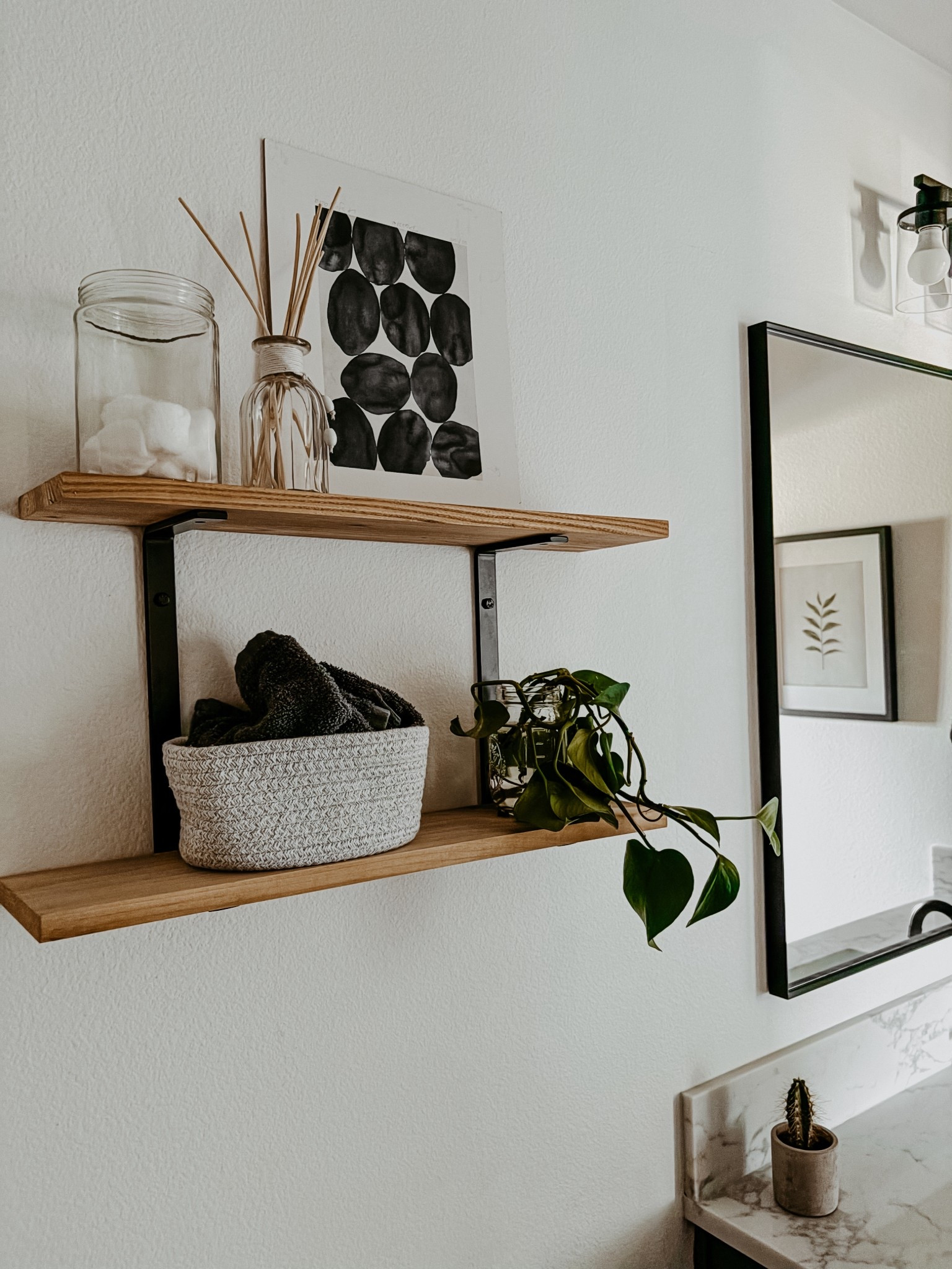 DIY bathroom shelves above the toilet for design and function. Easy weekend project.

#LTKHome