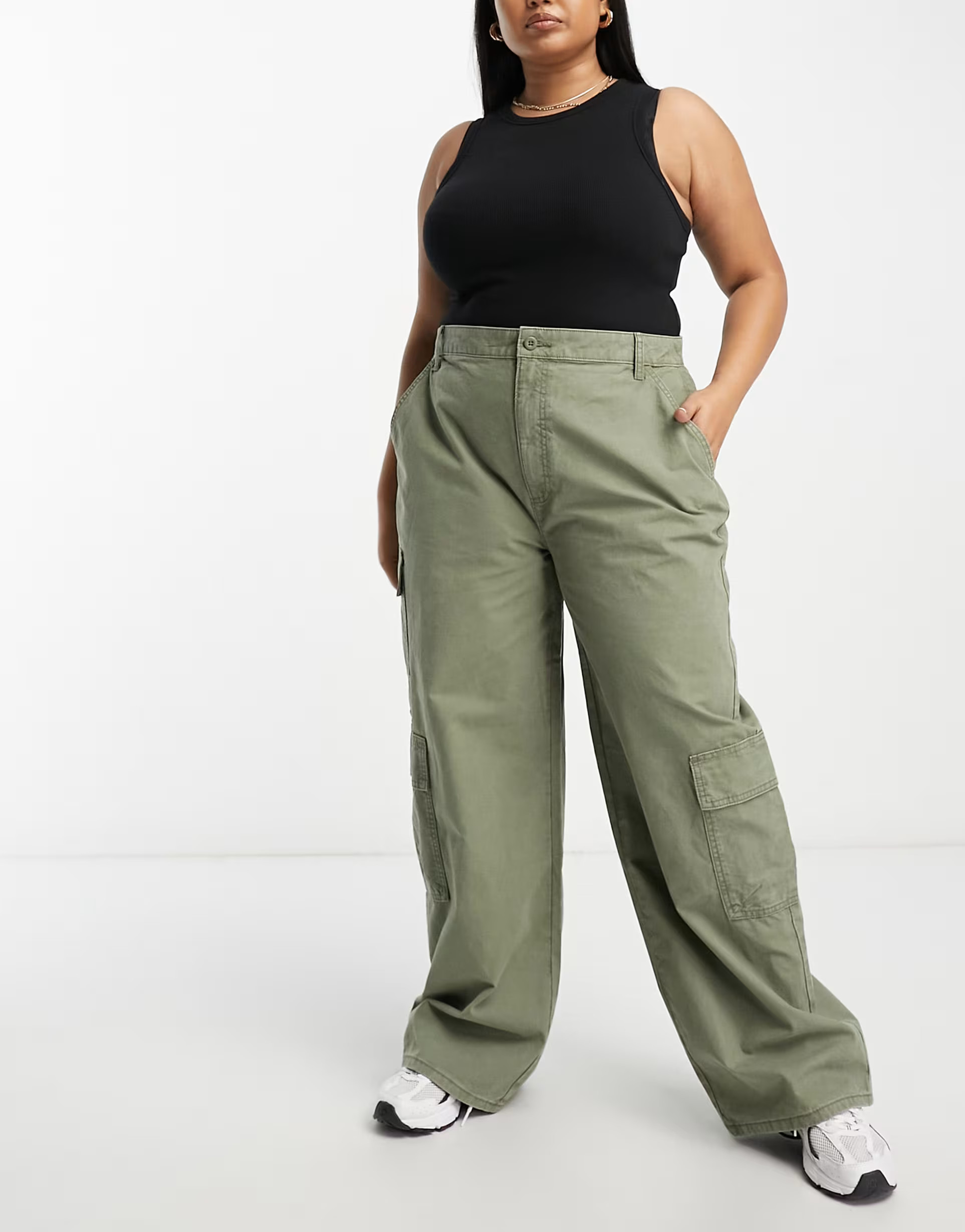 ASOS DESIGN Curve oversized cargo pants with multi pocket in khaki | ASOS (Global)
