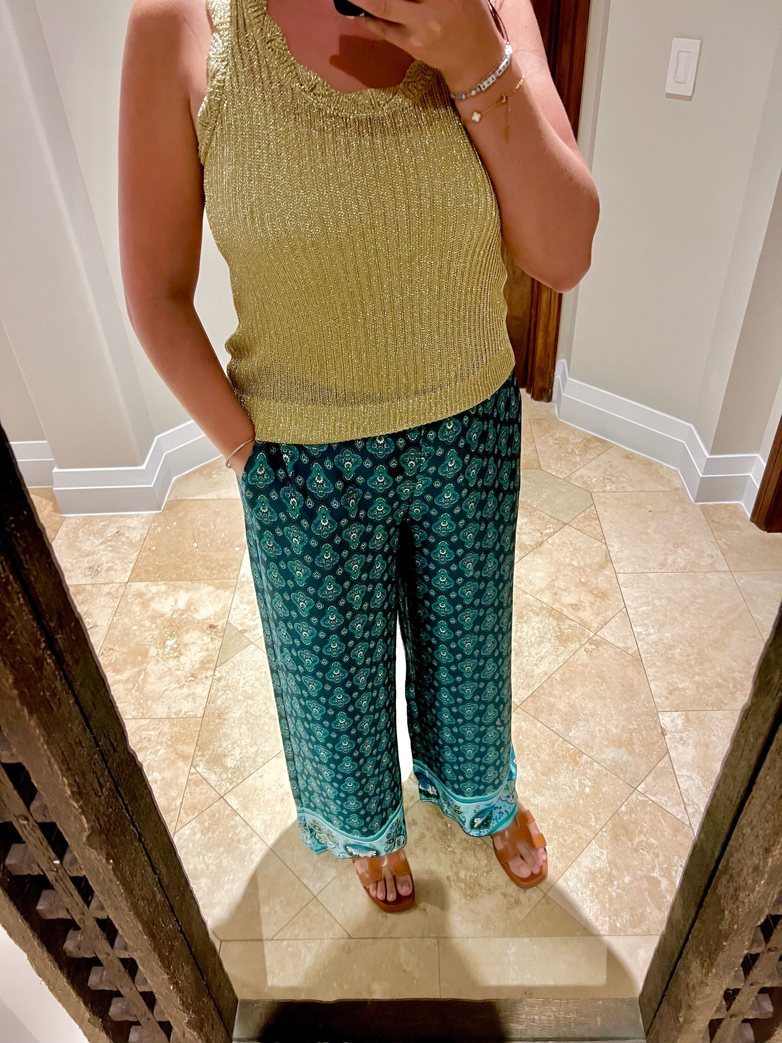 One of my favorite vacation outfits. Satin pants gold top blue green paisley patterned h sandals 

Wearing a large in the pants and medium in the top 

#loftcreatorclub LOFT  Amazon find 

#LTKSummerSales #LTKTravel #LTKMidsize