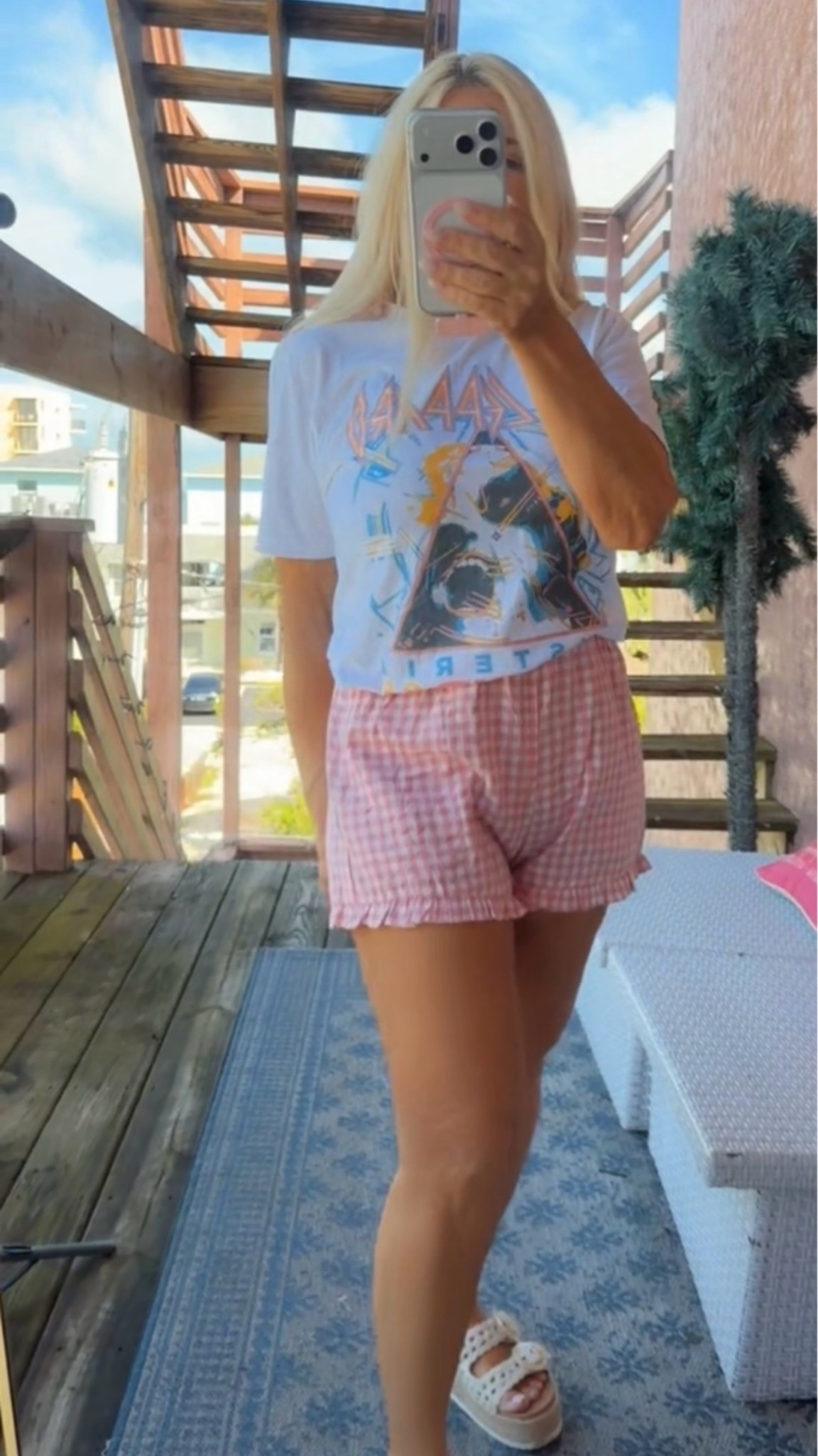Pink plaid boxer shorts styled with a graphic tee featuring pink details 💕 Such a cute and comfortable outfit for summer, travel days, running errands, or relaxing on the weekend.

#LTKOver40 #LTKootd #LTKPetite
