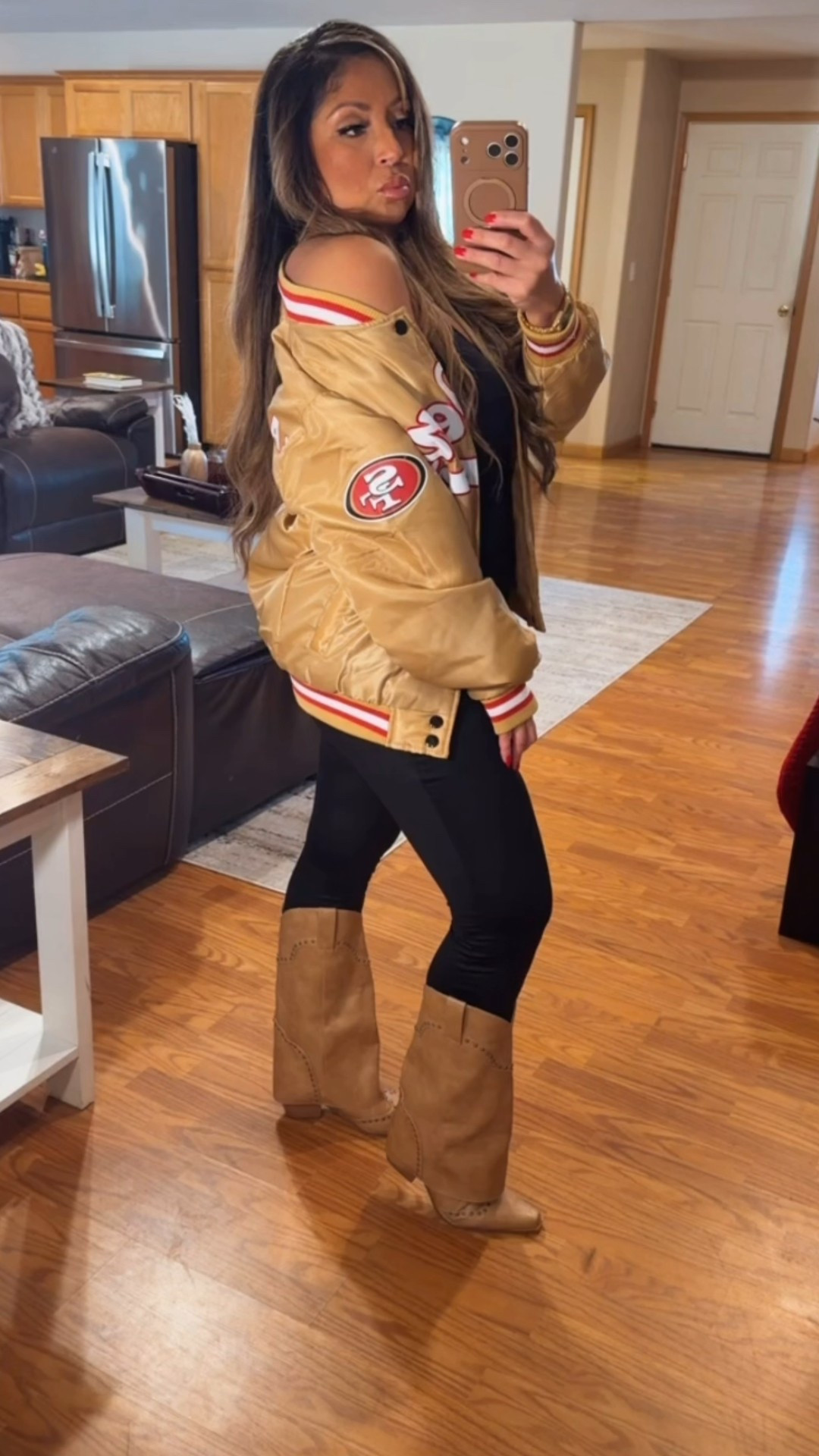 Perfect game day outfit 🏈 I love pairing an oversized sports team jacket with leggings and dressing it up with boots. These shark boots have been my most asked about boots lately ￼💋

#LTKootd #LTKPetite #LTKSaleAlert