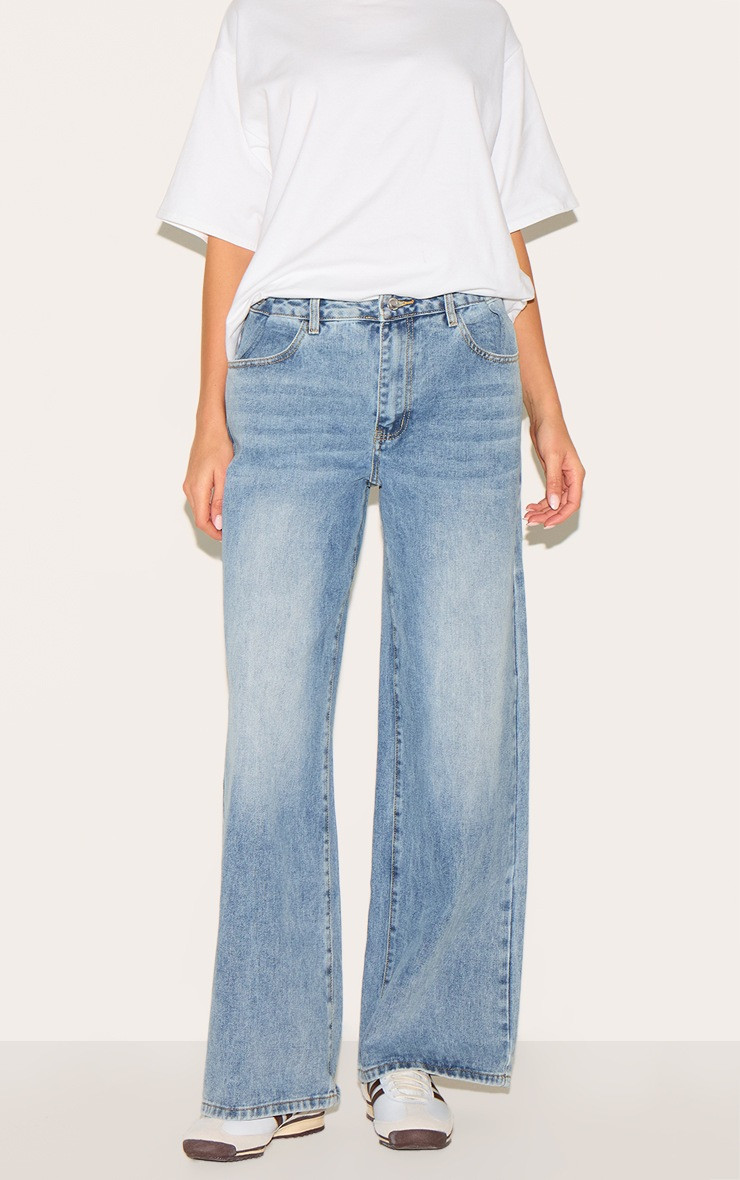 Light Blue Button Detail Wide Leg Jeans | Denim | PrettyLittleThing UK