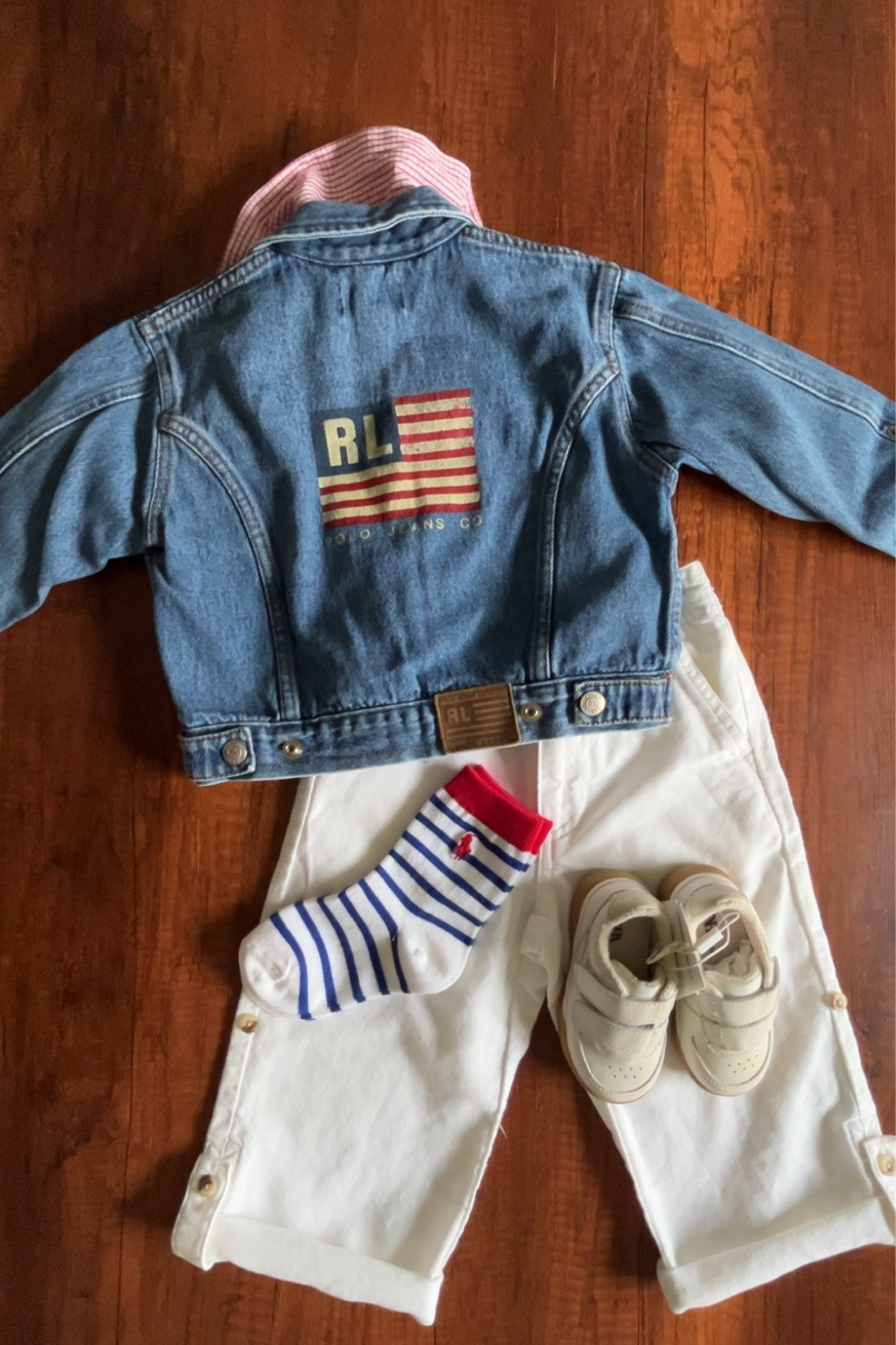 An iconic and classic Americana outfit for your little boy 💙 This vintage 2000s Ralph Lauren flag jacket is paired with cream linen trousers, and a gingham red button down. To add a pop of color, I’ve added some colorful Ralph Lauren socks and white sneakers, to create a classic but comfortable outfit for your kiddo ✨ Recreate a similar look with more modern pieces below!! ⬇️ 

#LTKKids #LTKBaby #LTKFamily