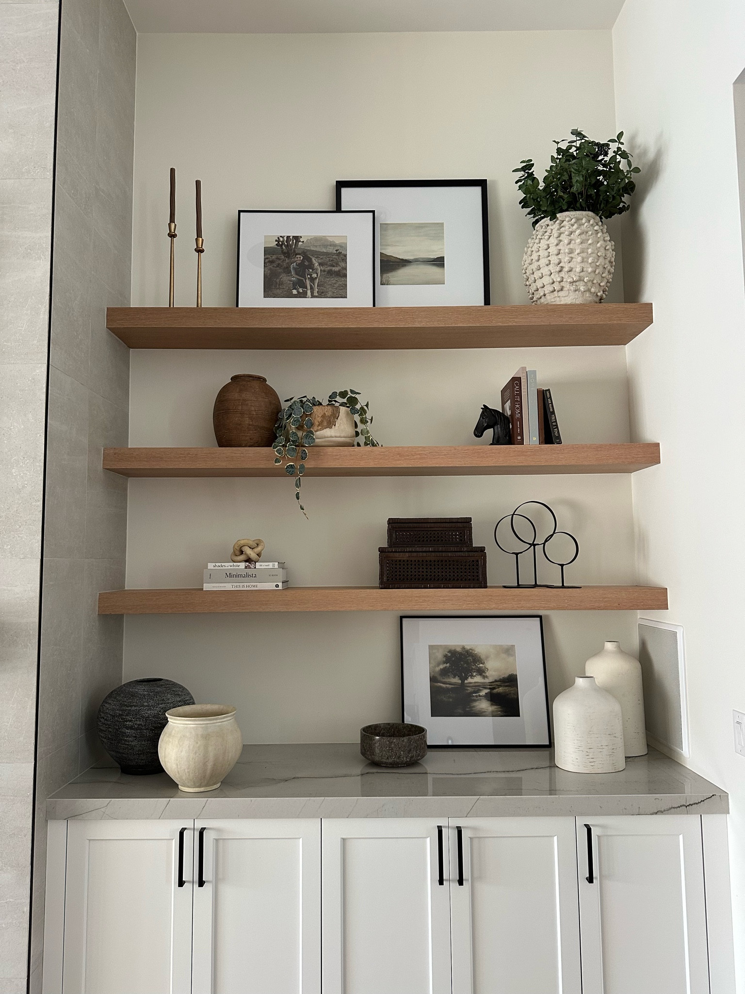 Client design

Shelf decor and styling. This is the right side of her fireplace shelves  

#LTKSeasonal #LTKHome