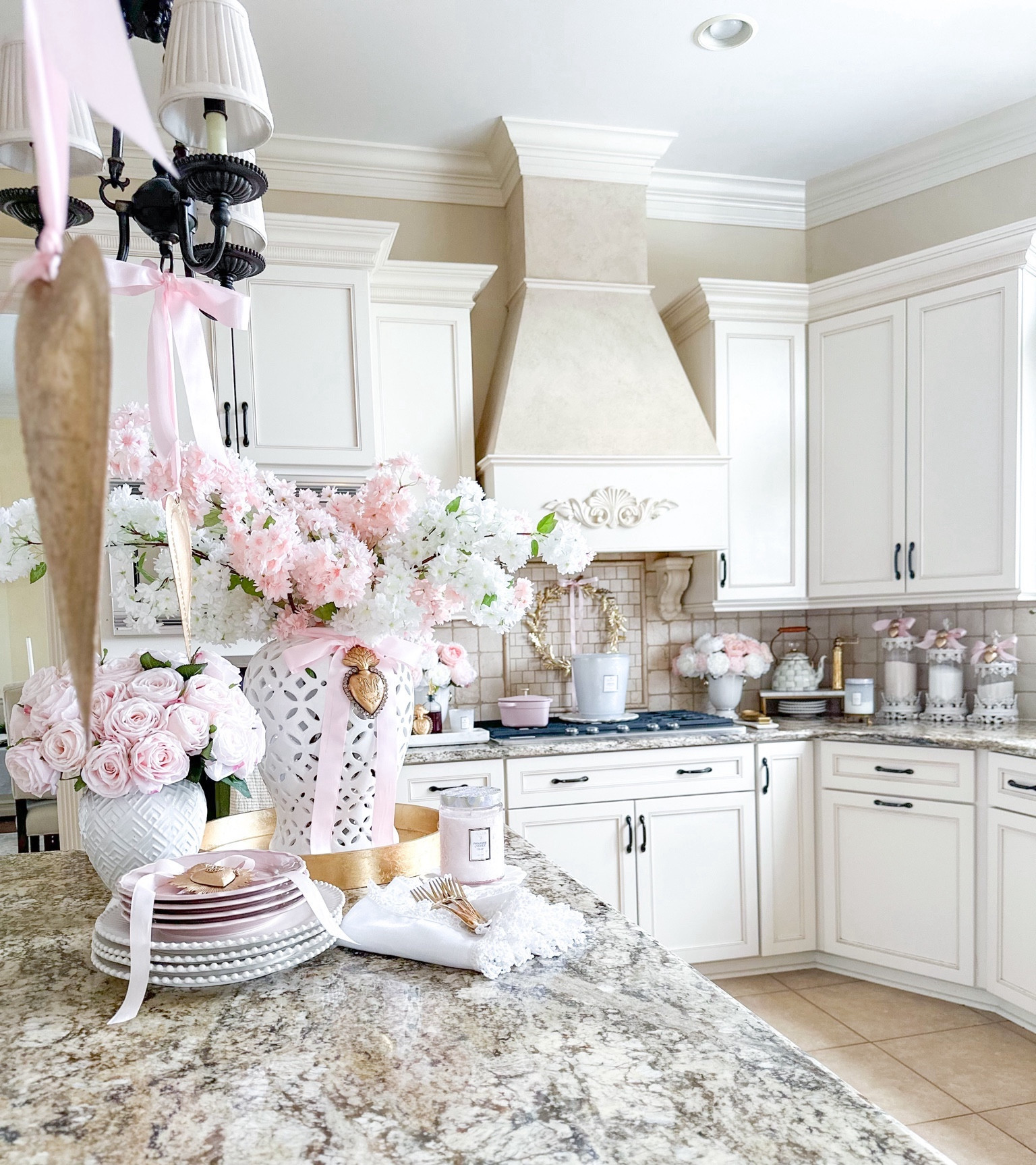 Valentine’s Day kitchen decor

Voluspa, pink candle, white candle, sacred hearts, Milagro heart, gold heart, pink decor, Galentines, valentines decor, kitchen decor, spring decor, ring vase, designer look for less, pink bows, white napkins, gold tray, white ginger jar, cherry blossom stems, heart cookware, pink cookware, Mackenzie Childs, marble tray, pink plates 

#LTKSeasonal #LTKhome #LTKGiftGuide