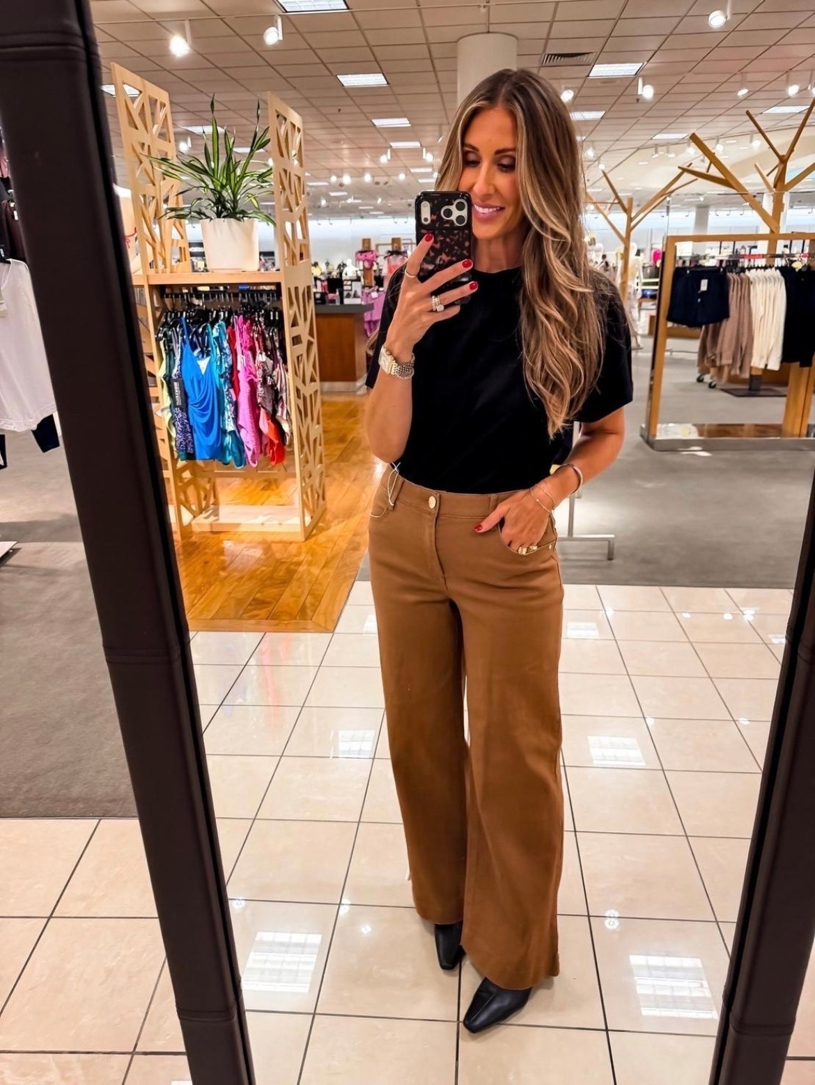 This combination of rich brown pants and a simple black tee is proof that the right basics can look incredibly elevated. The wide-leg silhouette gives these pants a tailored feel, while the stretchy fabric keeps them comfortable enough for a full day of work, dinner, or travel.

Size 8

brown wide leg pants, black tee outfit, fall outfit ideas, office outfit, business casual style, capsule wardrobe, neutral outfit, workwear inspiration, elevated basics, fall fashion, TheMomInStyle

#LTKOver40 #LTKSeasonal #LTKootd