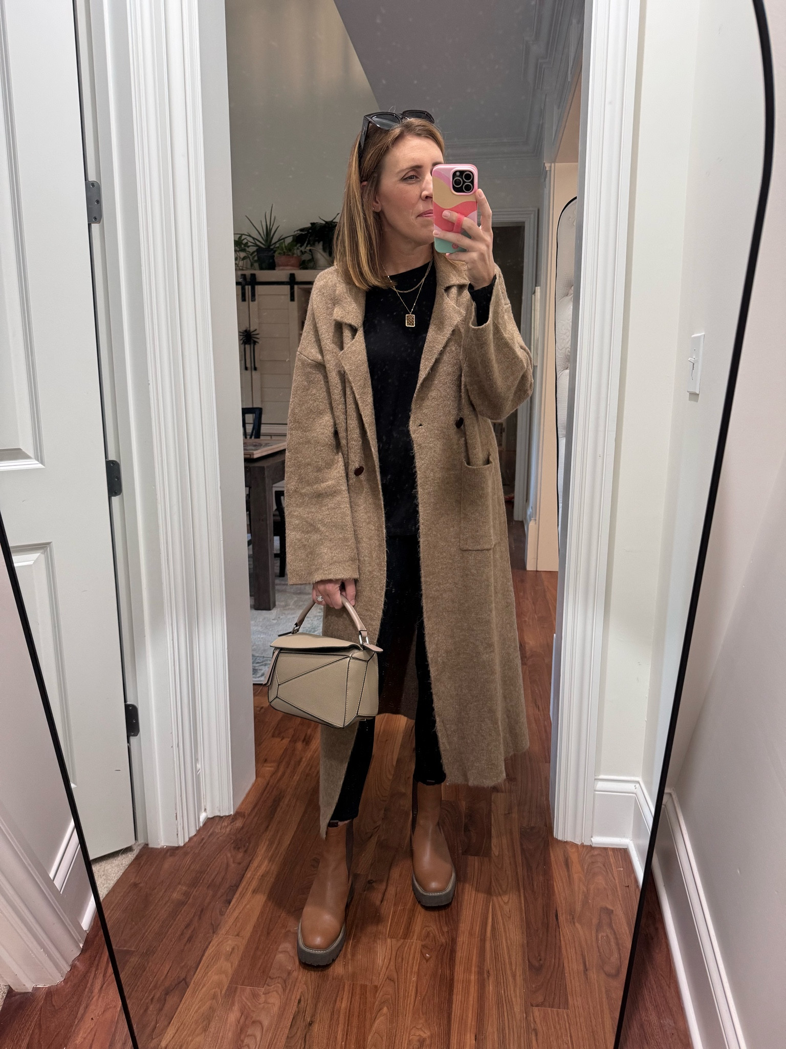 This sweater coat is going to get some major use this fall and winter! I love that you can wear as a sweater to complete an outfit or throw over an outfit to use as a coat, so cozy! Wearing a medium.

Purse is a great knockoff from the real designer one too. Wearing a medium in top, size 27 in jeans and boots are TTS and waterproof!

#LTKStyleTip #LTKFindsUnder100 #LTKSeasonal