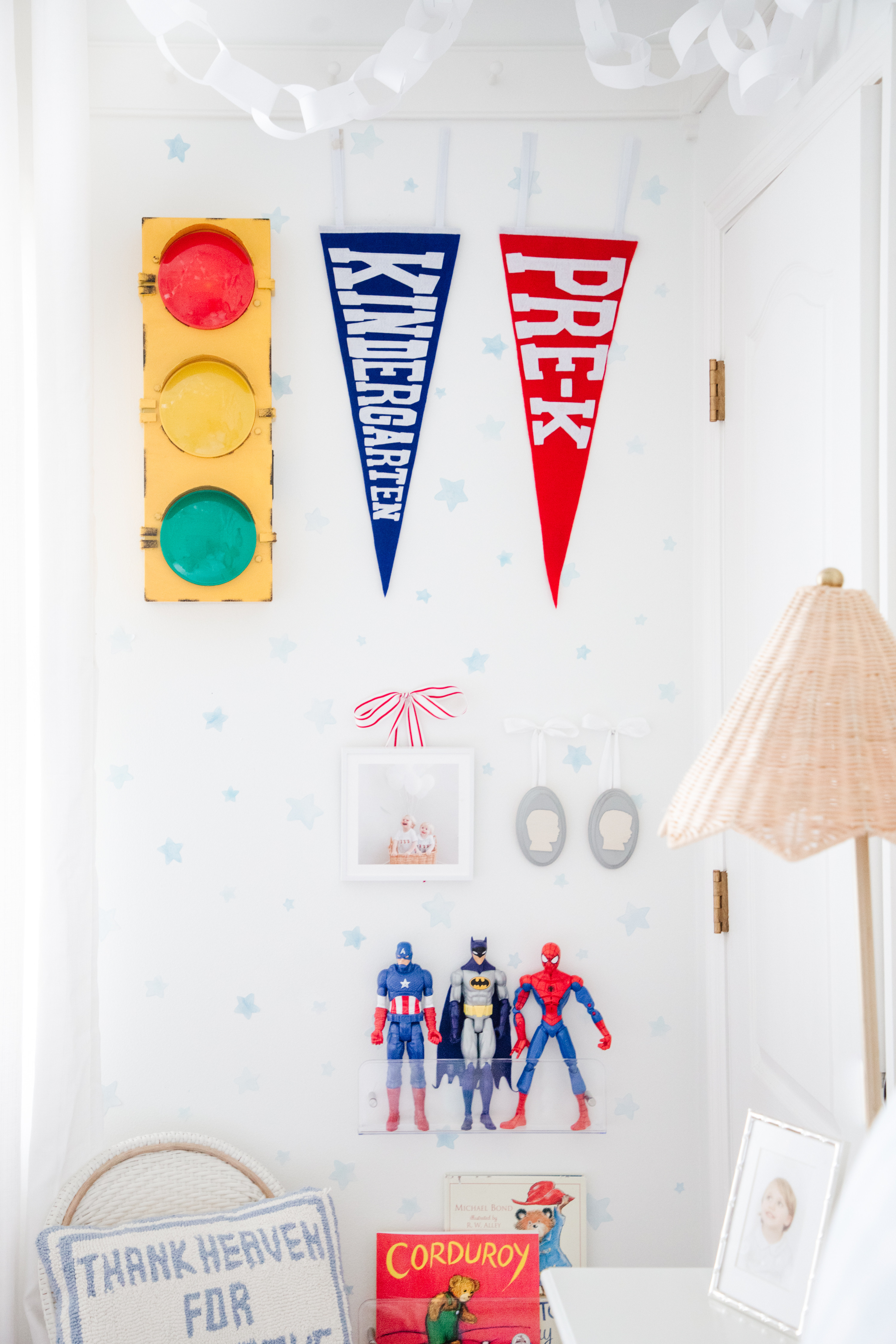 ✨ Grandmillennial meets little boy charm ✨ This light & airy classic boys' room is filled with thoughtful details, from vintage-inspired pennants to heirloom silhouettes and a cozy reading nook. But the star of the show? These sleek acrylic floating shelves—the perfect way to display action figures without the clutter! 💙❤️

Tap to shop the look, including the timeless decor, playful traffic light wall accent, and classic children's books! 📚🚦 #GrandmillennialStyle #LightAndAiry #ClassicBoysRoom #AcrylicShelves #LTKKids #LTKHome 

 #LTKHome #LTKKids