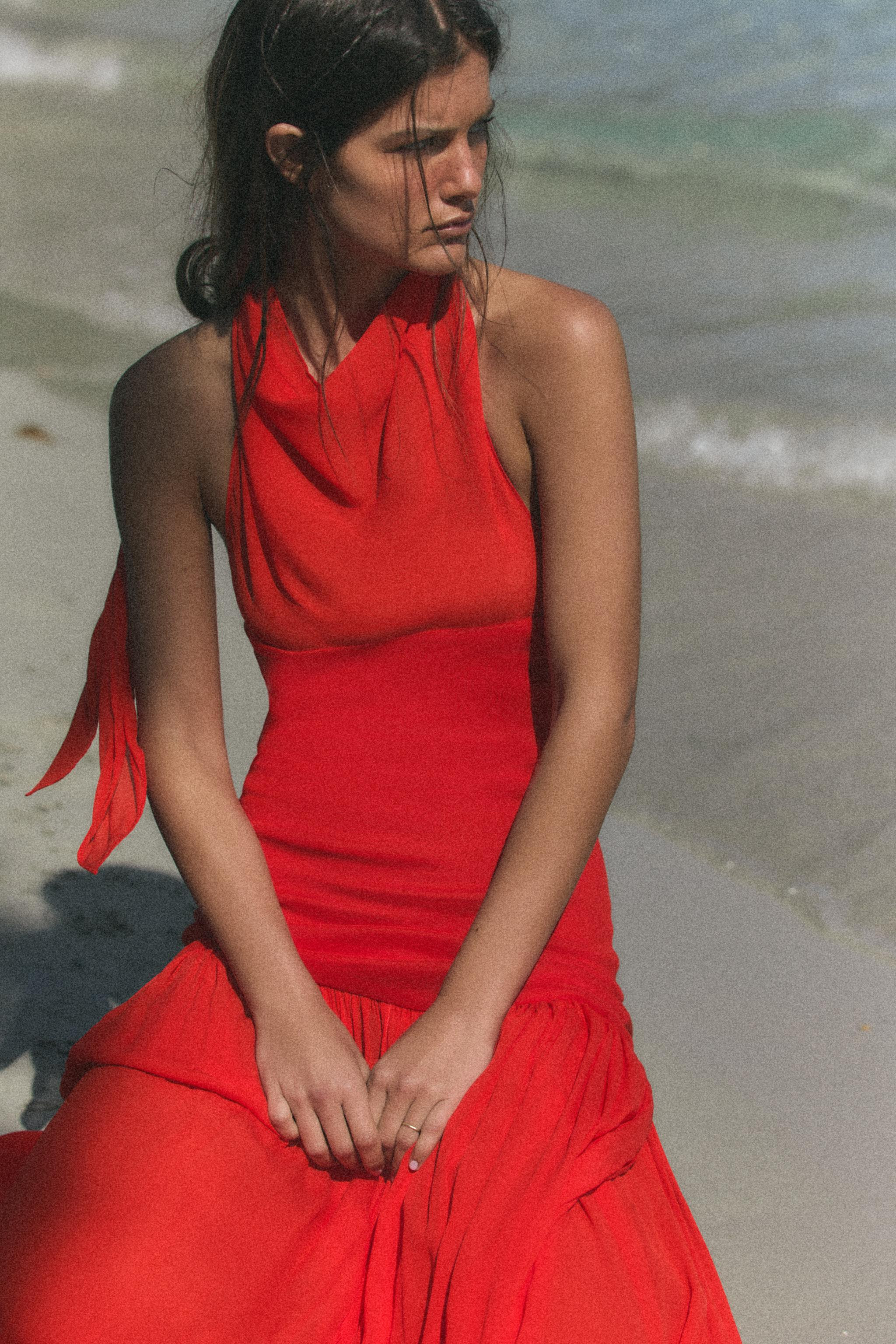 Halter neck dress with draped neckline. Tonal matching fabric detail. Voluminous hem. Back hidden... | Zara US