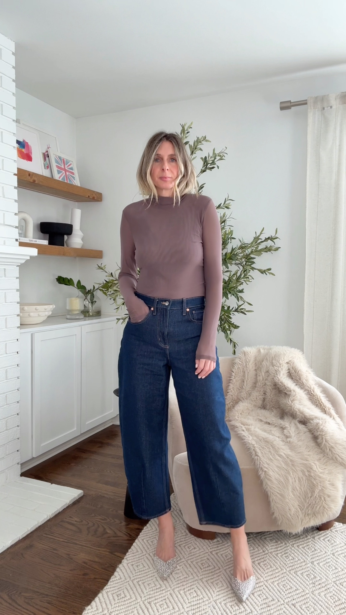 the fact that my camera fell at the start of this video made me laugh because this post is inspired by the kardashians….and I know this is not up to their standards! 🫠 i love how kim and khloe just wear jeans and a simple top. i think it's so striking, it's so simple, and it's so easy to replicate! linked the target tops i’m wearing, and alsothe SKIMS pieces that kim and khloe wear! 

WHITE + BLACK MOCKNECK - medium. 
super comfy. super cool! wear day or night! 

GREEN + BROWN V NECK - small
loooove a v neck. my little trick…pull it a little wider off your shoulder for a more evening/dressy vibe! 

OFF THE SHOULDER - small in the burgundy. medium in the black. 
i love an off the shoulder number. timeless, sexy, cool!  

BARREL JEANS - size 4
my all time favorite barrel jeans. subtle barrel. and they suit everyone…even those who think they won’t!! 

SPARKLY HEELS - size UP!
i got these at zara years ago, but found a great amazon dupe! 

#LTKmomlife #LTKHoliday #LTKFindsUnder50