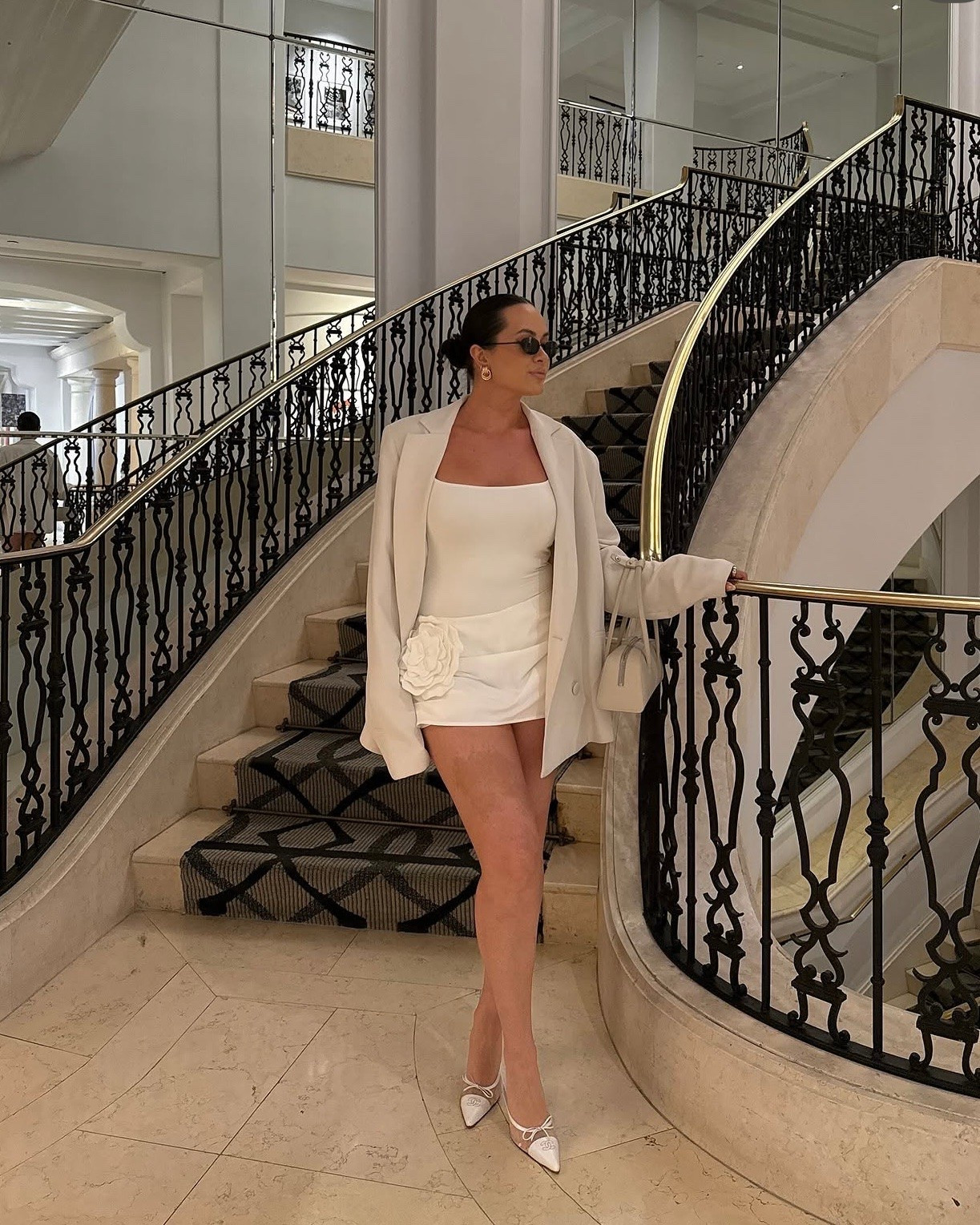 Chic neutral blazer and mini skirt outfit for summer - wearing my favorite white kitten heels

#LTKootd #LTKSeasonal