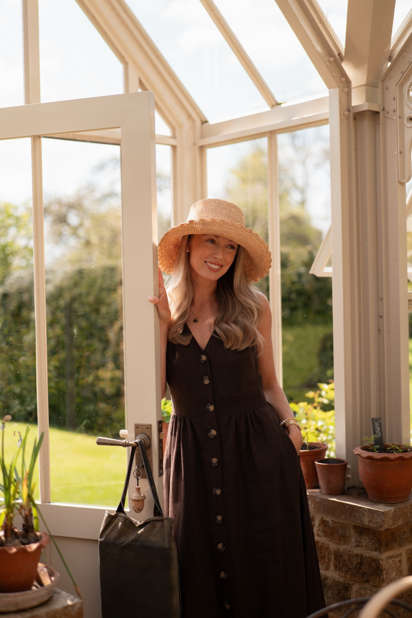 The perfect brown linen dress from the highstreet 🤎 Linen button dress, summer dress style, effortless summer dress 🫶🏼 Straw hat, summer accessories, countryside aesthetic. 

#LTKsummer #LTKspring #LTKdresses