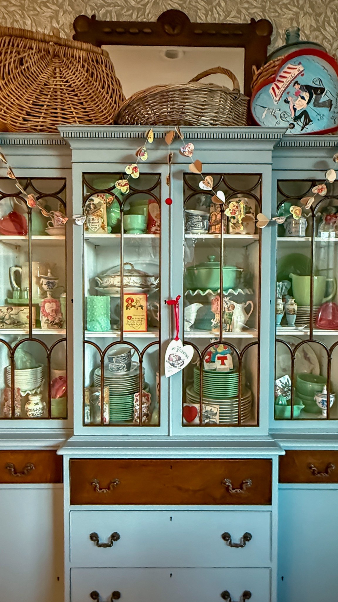 This might be the last time you see this hutch in blue!! I’m loving the jadeite and vintage valentines combo though! Get the same look with the items linked here! My exact heart garland is linked as well!

#LTKFindsUnder100 #LTKHome #LTKSeasonal