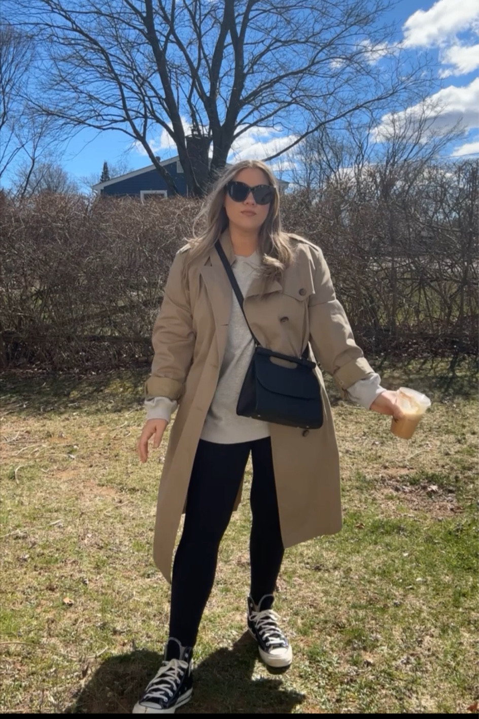 Trench coat and converse chuck 70 outfit

Amazon sweatshirt and leggings 