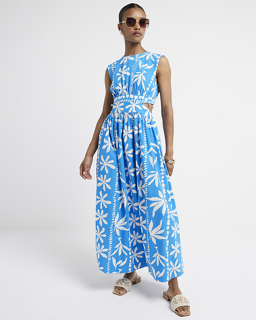 Blue floral cut out swing maxi dress | River Island (UK & IE)