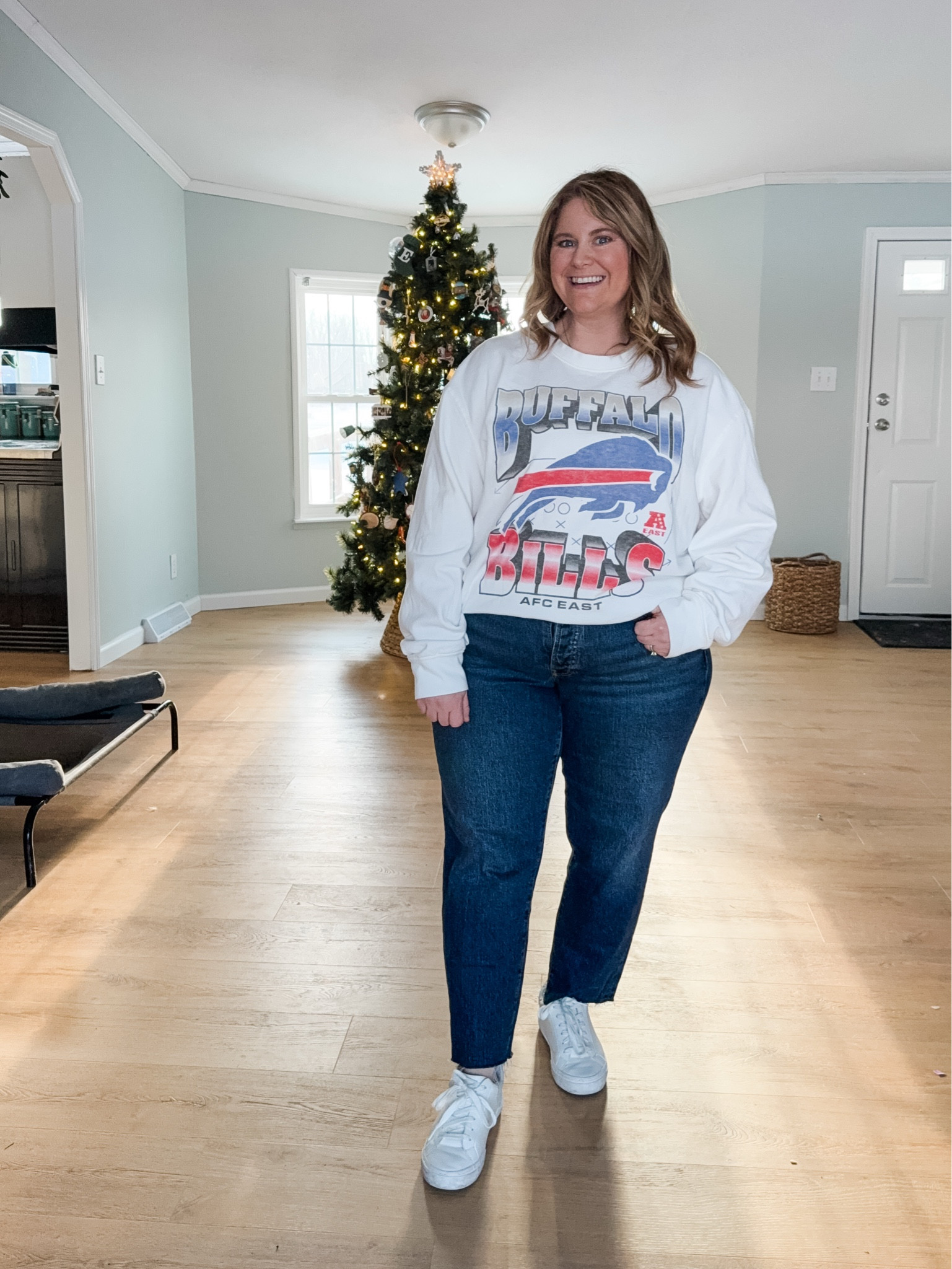 Straight jeans outfit idea - graphic sweatshirt (XL) and jeans (14 petite) with sneakers.  

I love my Bills sweatshirt but I also linked other graphic sweatshirts.  Mountain Moverz has some of my favorites and you can use code STEPHSHARES to save!

#LTKPetite #LTKSeasonal #LTKMidsize