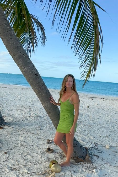 Gorgeous green metallic dress, by one of my favorite brands. #beach #beachclothes #vacation 

#LTKtravel #LTKsalealert #LTKswim