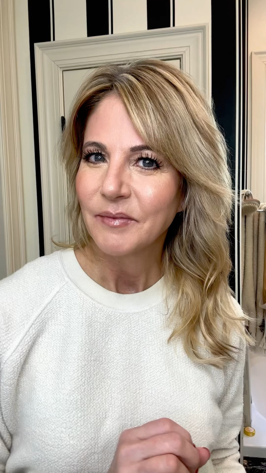 I have been told on more than one occasion that women over 50 should not have long hair.  So I got extenstions 😂

My hair is naturally long, but it is very thin and fine.  Before I got extensions I ALWAYS wore my hair up.  I hated the way it looked down.  Now I almost always wear it down 😊

These are the products I use to get a blown out/wavy look:

Aveda Invati thickening foam:  This is the best product I have found for volume and fullness without being heavy and weighing my hair down.  I use about 6 pumps and work through wet hair.

Davines OI All in One Milk:  Help soften and detangle, and it smells amazing!  I use about 2-3 pumps mainly on the ends of my extensions (wet hair).

Davines Blow Dry Primer:  To help protect from heat, it also works to add body and anti-humidity.  I spray this all over before I blow dry.

Shark FlexStyle Air Drying & Styling System:  I love the hair dryer.  It's very powrful and dries quickly!  The attachment I use the most is the auto-wrap curler.  I use it on my shorter layers.

Hot Tools1 1/4 inch Extra Long Curling Iron:  I section my hair into four pieces and curl.  

Davines Texturizing Dust:  This is a great product for fine hair.  It gives my hair texture volume and helps hold it in place.

Kenra Volume Spray 25 Hair Spray:  My favorite super hold hairspray without being too stiff.

#LTKover40 #LTKVideo #LTKbeauty