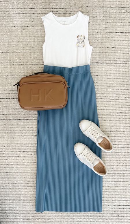 Spring outfit with blue ribbed midi skirt paired with white bodysuit and sneakers for a chic look! Super comfy and easy to throw together. Can be dressed up more with sandals or heels! 

#LTKstyletip #LTKSeasonal