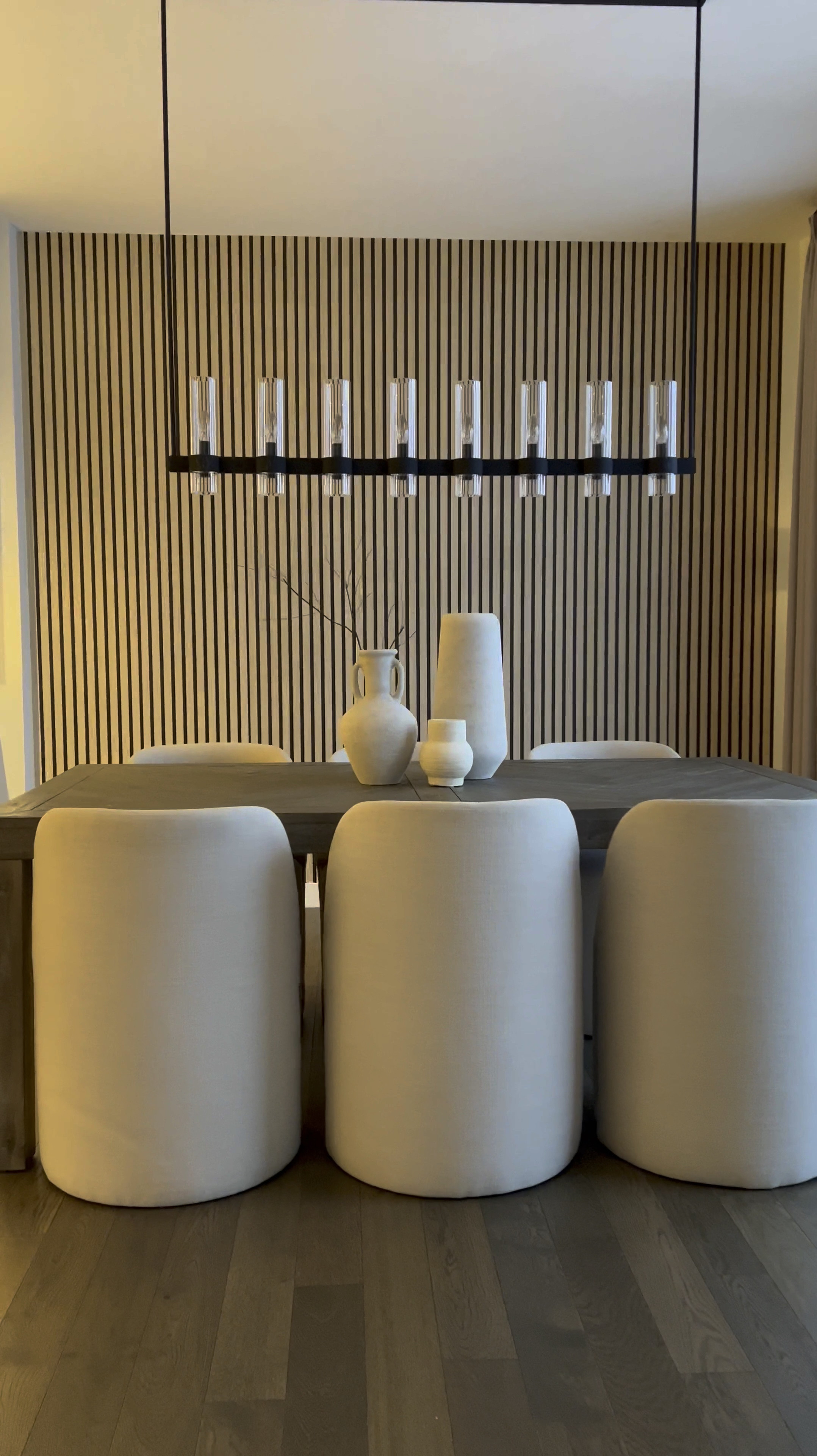 Hey friend! ☺️

If you’re planning a home makeover, here’s a super simple way to upgrade your wall and achieve that trendy wooden slat look with peel-and-stick wallpaper! 🎉

Tips:

The wallpaper is peel-and-stick, so removing it is easy—just use a blow dryer to avoid damaging your paint or drywall.
I used 3 rolls for my 9ft x 10.5ft wall.
This is the easiest wallpaper I’ve ever installed! The design is forgiving, so even if you overlap a little, it’s barely noticeable, making installation stress-free.
I also added 16ft plug-in LED light strips behind the mirror for a warm white glow (3000K). 🔌 My mirror is 83 inches tall by 48 inches wide. 🪞

The best part? The sconces! They’re rechargeable and attach easily using screws or a peel-and-stick adhesive. The magnetic base allows you to remove them without needing to reinstall. 💕

Check out the links to the rest of the items below! ☺️

#LTKVideo

#LTKStyleTip #LTKSaleAlert #LTKHome