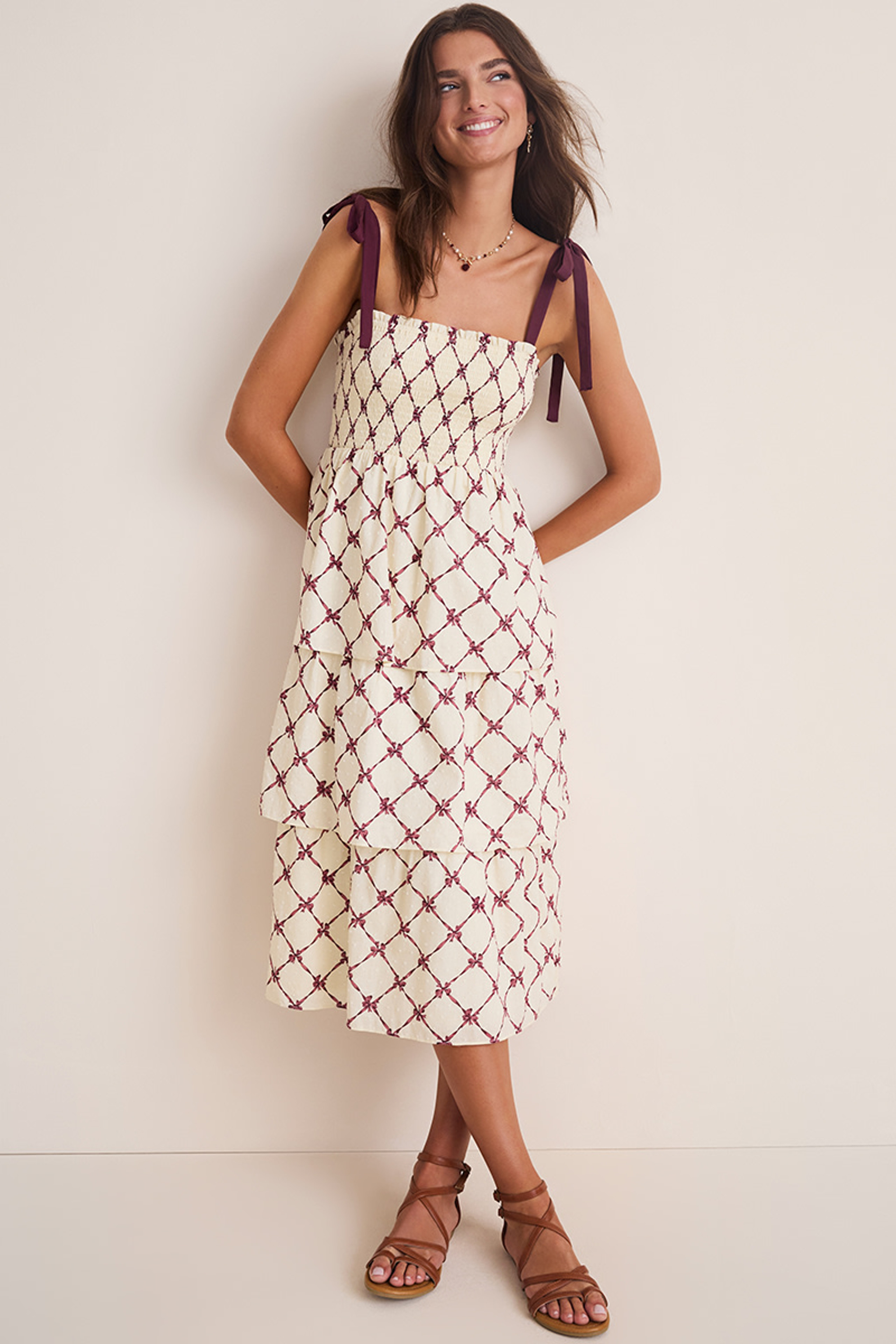 Angie Bow-Print Smocked Tiered Midi Dress | Francesca's