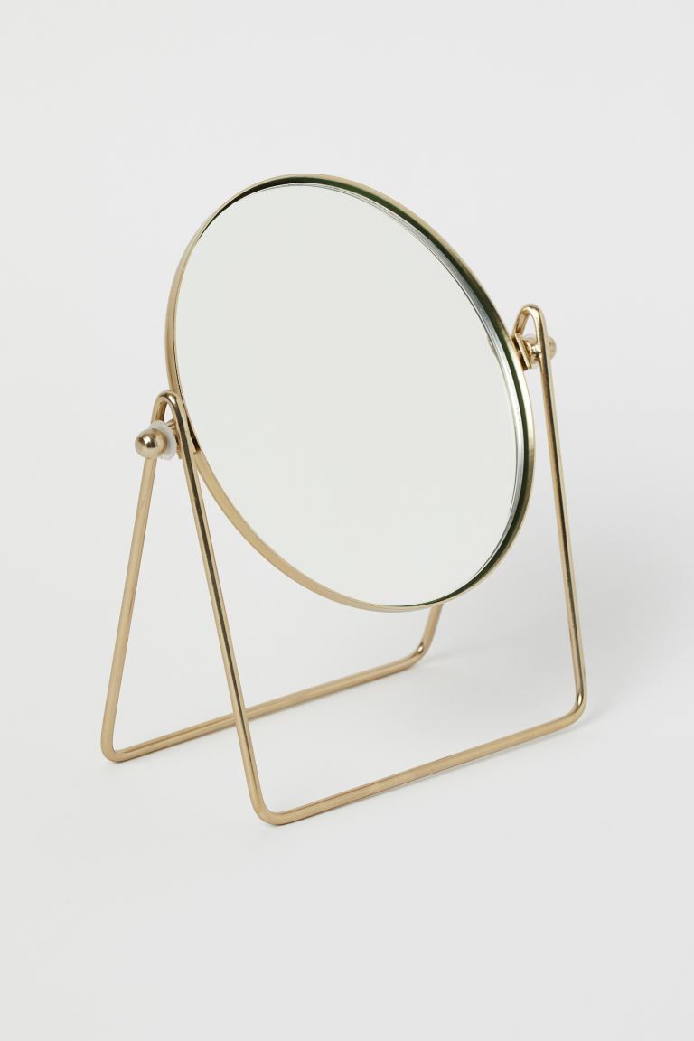 Small table mirror with a metal frame. The angle of the mirror is easy to adjust by twisting the ... | H&M (UK, MY, IN, SG, PH, TW, HK)