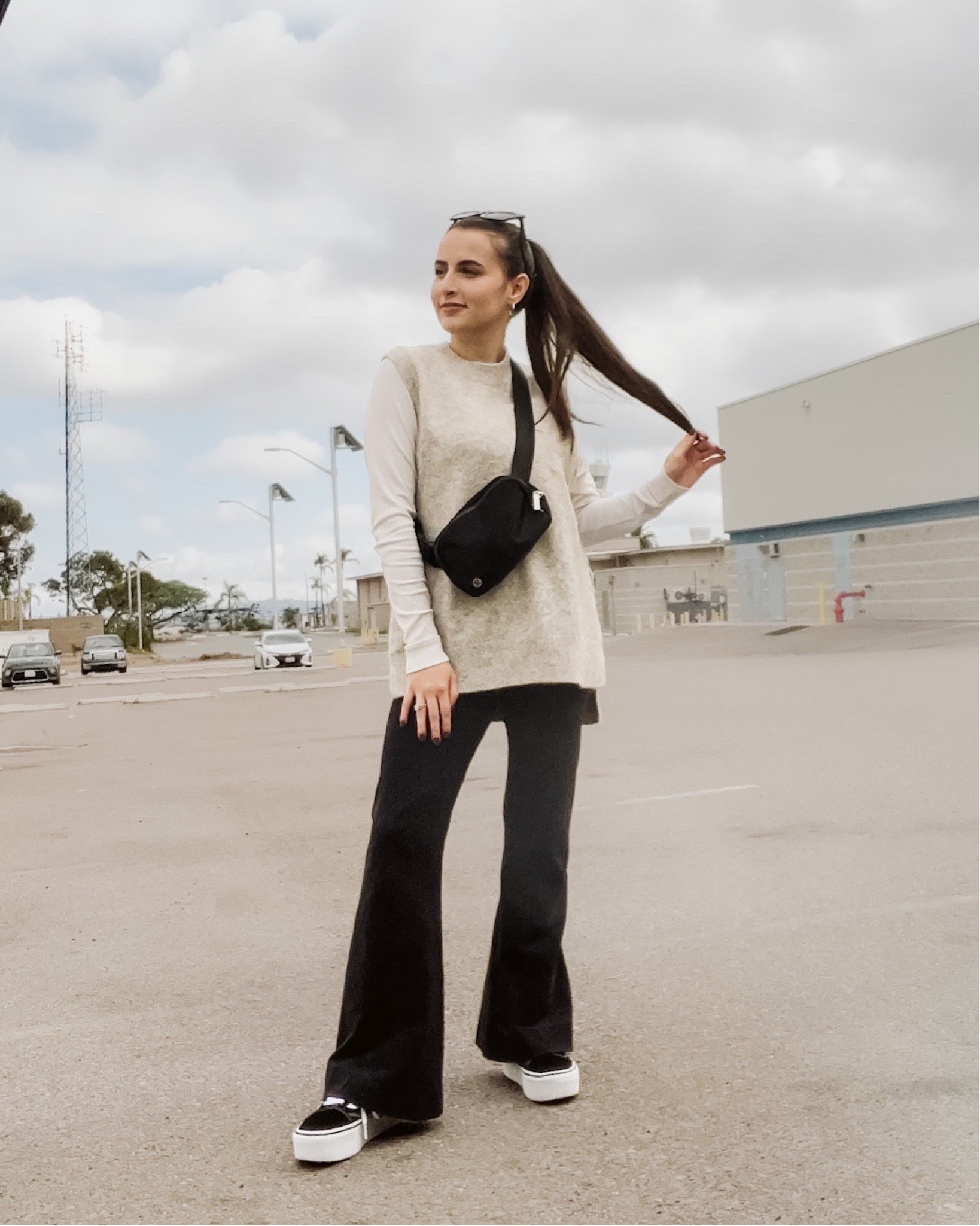 sunday church outfit of the day | modest fashion | comfortable style | 90s inspired outfit | momfit of the day | h&m sweater vest | old navy top | american eagle pants | american eagle leggings | flare leggings outfit | vans | platform sneakers | everywhere belt bag | lululemon | #momfit #ootd #modestfashion #falloutfitinspo 

#LTKunder100 #LTKSeasonal #LTKfit