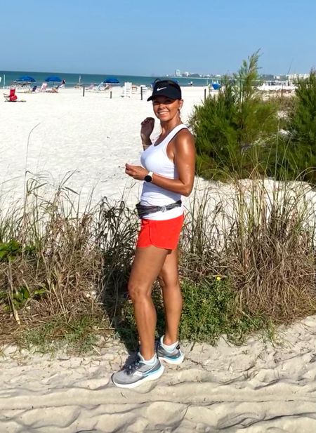 Beach workout. Workouts don’t stop just because you’re on vacation. Anti-stink technology in athletic tank tops, cool running shorts ( you’ll love the price on these), a Nike visor to shade you eyes, a Garmin, running shoes, AirPods for music, and a hip belt to store your gear. 
kimbentley,  exercise outfit  #LTKfit 

#LTKActive #LTKfitness #LTKtravel