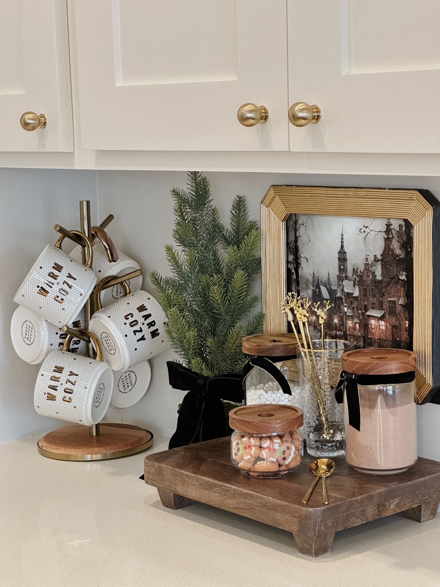Creating a mini hot cocoa station has never been so easy—and it’s perfect for family and guests to enjoy a little holiday cheer! ☕✨ A few of my favorite touches:
🍫 Glass Jars – These clear jars with acacia lids are perfect for displaying marshmallows, cocoa powder, and chocolate chips! The airtight seal keeps everything fresh and ready for that next cup.
✨ Gold Deer Head Swizzle Sticks – A fun (and festive!) way to stir up some cocoa magic. Plus, they’re reusable and stylish for every drink.
📸 Brass Pedestal Picture Frame – Love using this to add a festive little sign or family photo for a cozy touch.
All the products here are linked on my LTK—check them out and create your own cozy cocoa setup! Who else loves having a hot cocoa station for the holidays? 🎄
#HotCocoaStation #HolidayHosting #CozyKitchen #kitchenorganization #hotchocolatebar #hotchocolatestation #christmastip #christmasmagic #targetstyle #targetfind #amazonfind #amazonhome

#LTKSeasonal #LTKHome #LTKHoliday