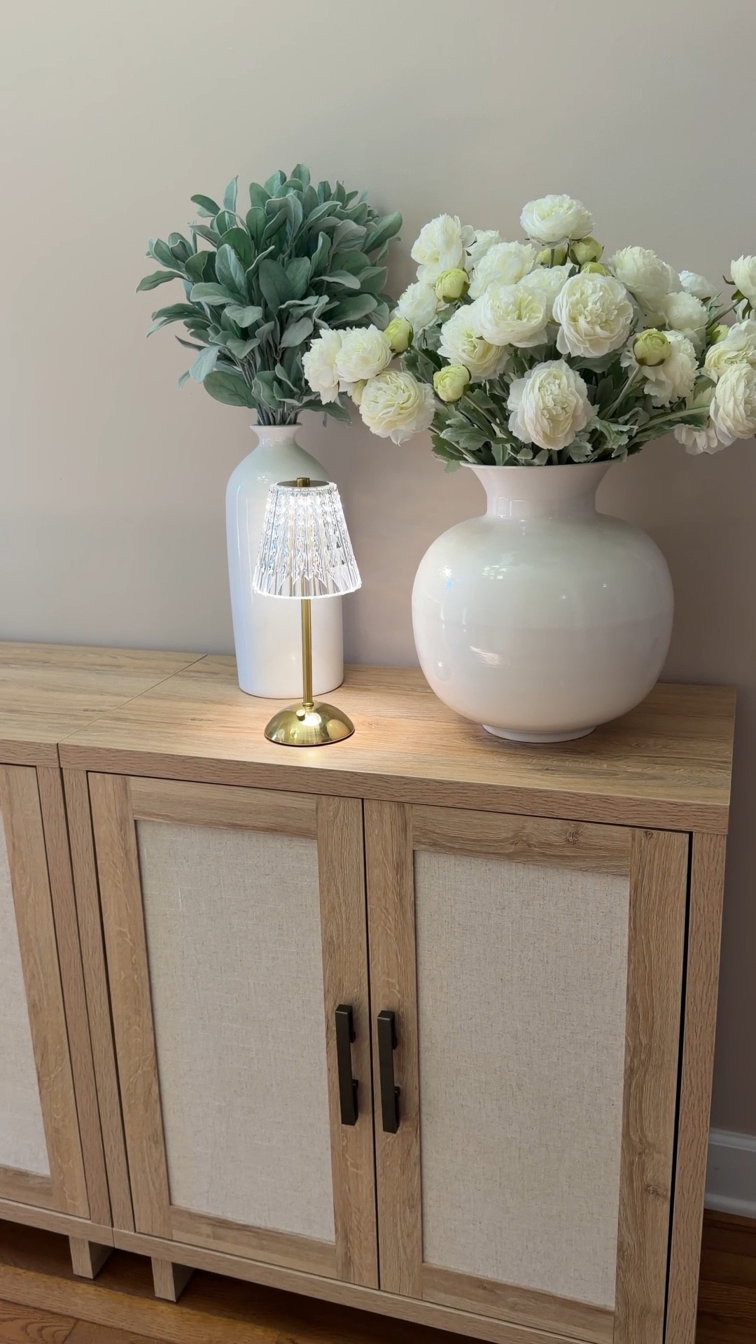 This crystal lamp has 3 temperature settings + is dimmable! I also linked our accent cabinet, white vase, and artificial peonies. 

#LTKhome #LTKVideo