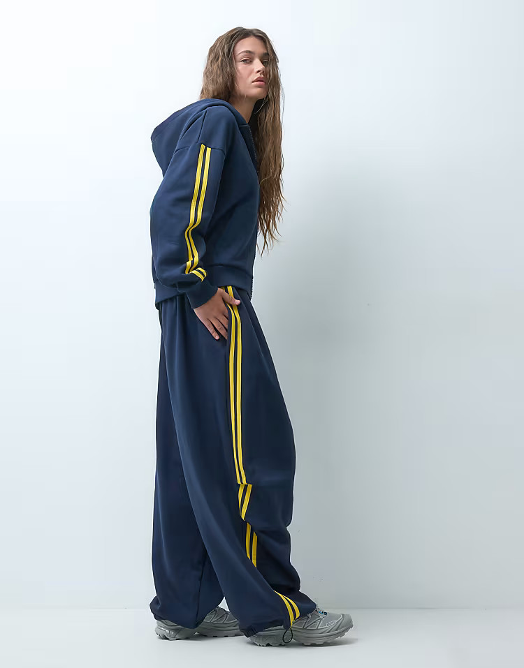COLLUSION low rise flared sporty track pants in navy - part of a set | ASOS (Global)