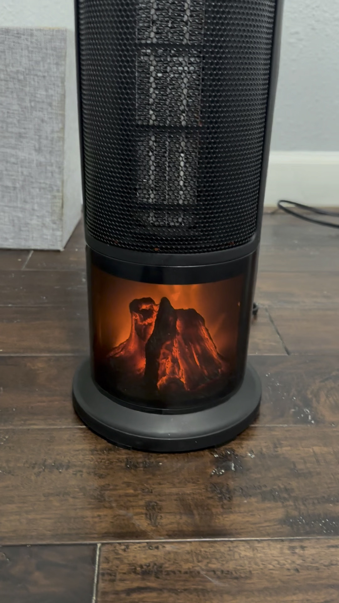 Tower Space Heater with remote! Looks like a fireplace!! Electric heater, portable heater, small heater, desk heater, space heater 
#portableheater #smallheater #electricheater #spaceheater 

#LTKhome #LTKSeasonal