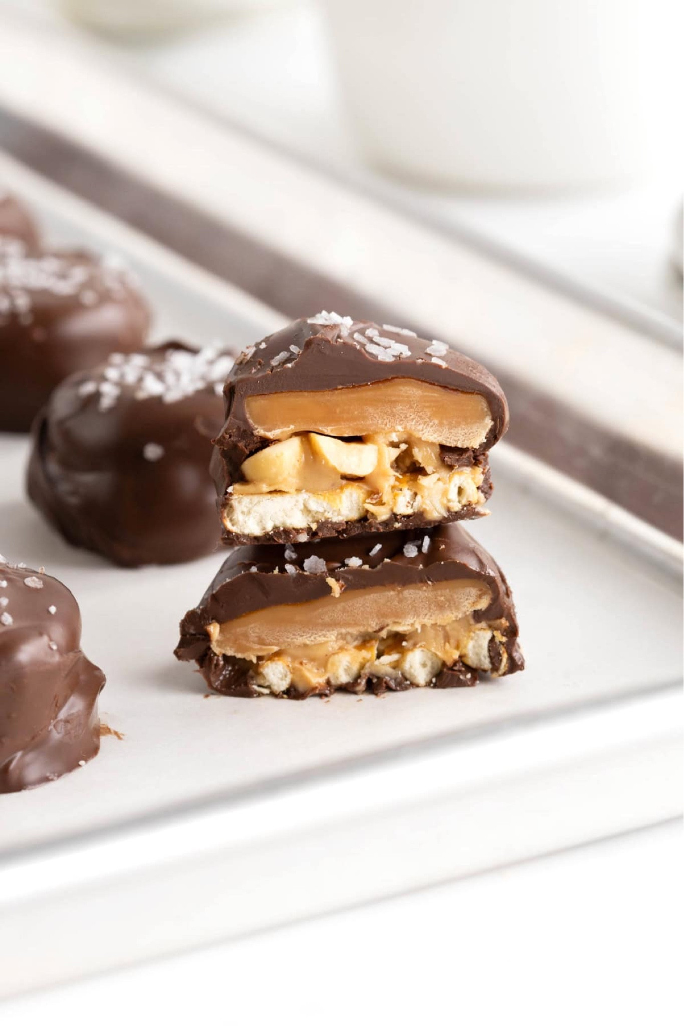 Take 5 Candy Bar Bites combine layers of chocolate, caramel, peanuts, peanut butter, and pretzels in mouth-watering two-bite candies