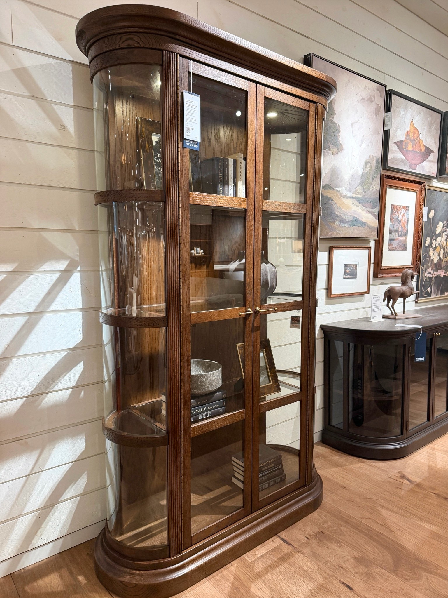 Modern design with the charm of a vintage find. 🤎 The Stanton Curio Cabinet from Crate & Barrel has such a unique look with its graceful curves, warm brown oak, and elegant glass display. 💫 I love how it beautifully showcases your favorite pieces while bringing so much character to the room. The subtle brass details are the perfect finishing touch! ✨ I’ve linked it in my LTK! @Crate & Barrel  #storagecabinet #displaycabinet #vintageinspired

#LTKHome #LTKSaleAlert #LTKmorningroutine