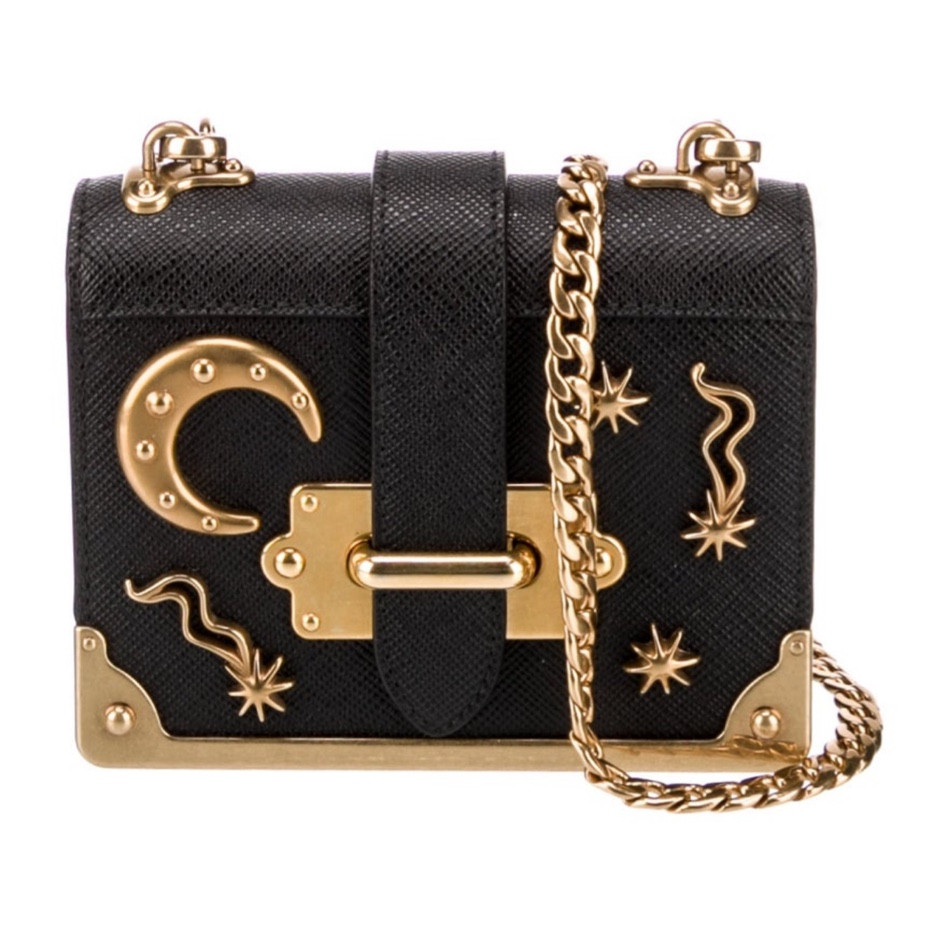 Prada Micro Cahier Astrology/Celestial Collection Bag in Black Saffiano Leather FOR UNDER $800!!! It’s so rare I find these handbags under $1,000, especially from this collection. Obsessed! Vintage handbag of my dreams from The Real Real!

#LTKsalealert #LTKitbag