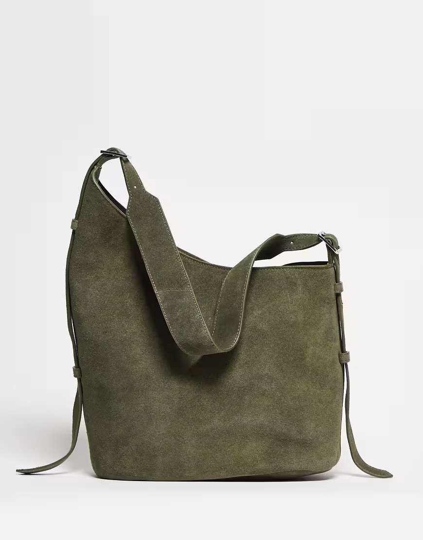 ASOS DESIGN suede asymmetric tote bag with side buckle in olive-Green | ASOS (Global)