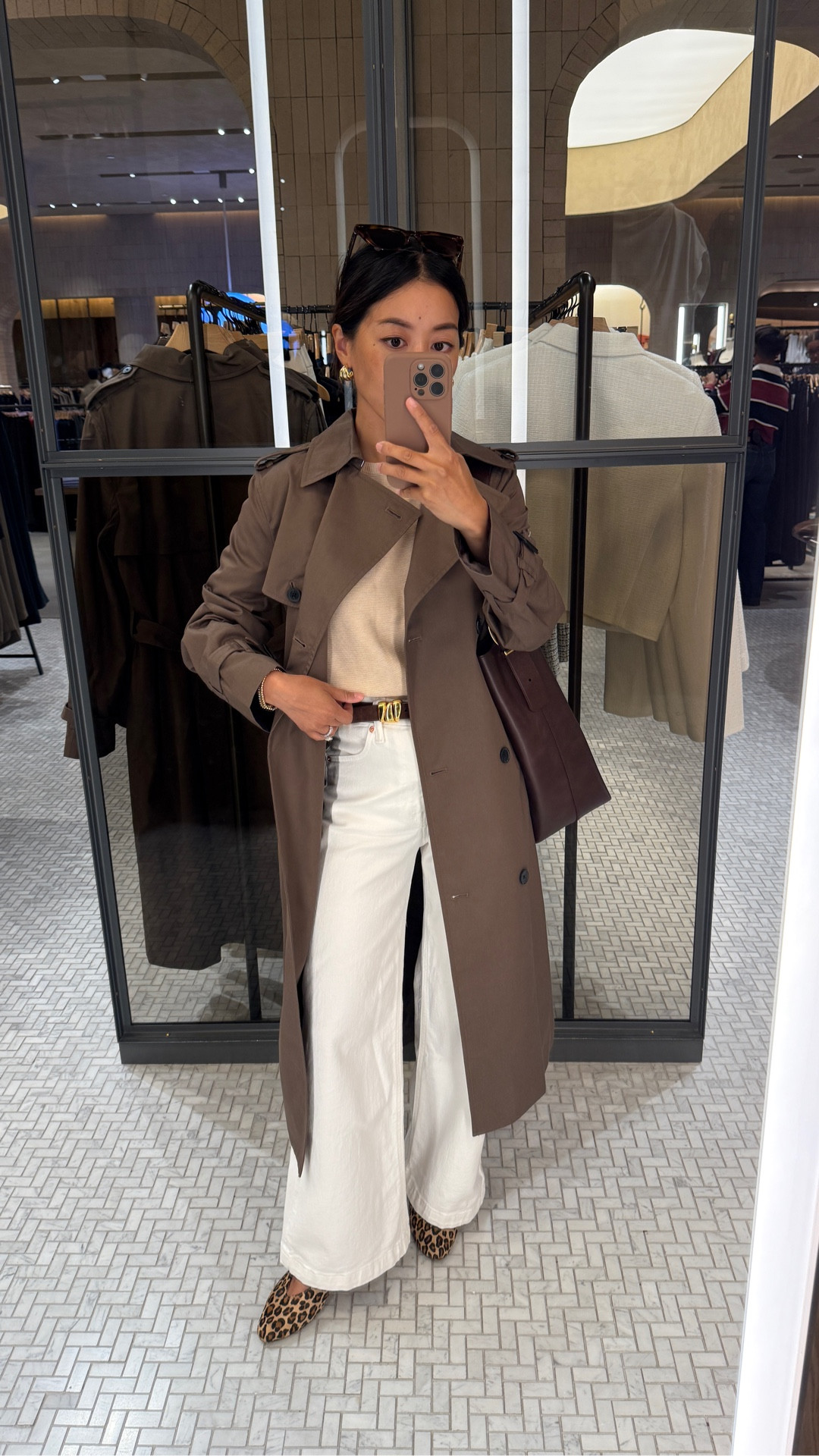 Aritzia trench coat try on for fall. Their new Cola Taupe color is gorgeous! Perfect deeper neutral that pairs with so much 

• Aritzia Finch trench coat 2XS sleeves a little long on me. Otherwise slim fit and a chic midi length. Same beautiful cola taupe color comes in their drape pants too 

• Gap high rise stride wide leg ankle jeans size 24 regular (not petite)
I also linked similar bottoms I wear with flats 

• Quince lightweight cotton Dolman sweater xs - loose oversized cut with an easy, sophisticated look. Xs is a generous fit on me, I usually tuck this and you can shrink by washing on warm

• Sezane leopard Matilda ballerina flats - worn with heel lifts so they don’t rub my ankles

• Madewell triple metal keeper belt xxs

• Madewell bucket tote, original size easily fits a laptop. The smaller new Jcrew suede one is also beautiful!

• BP sunglasses

Fall transitional outfit that also works for smart casual office workwear, mom style, petite friendly, early fall transition outfit

#LTKPetite #LTKWorkwear #LTKStyleTip