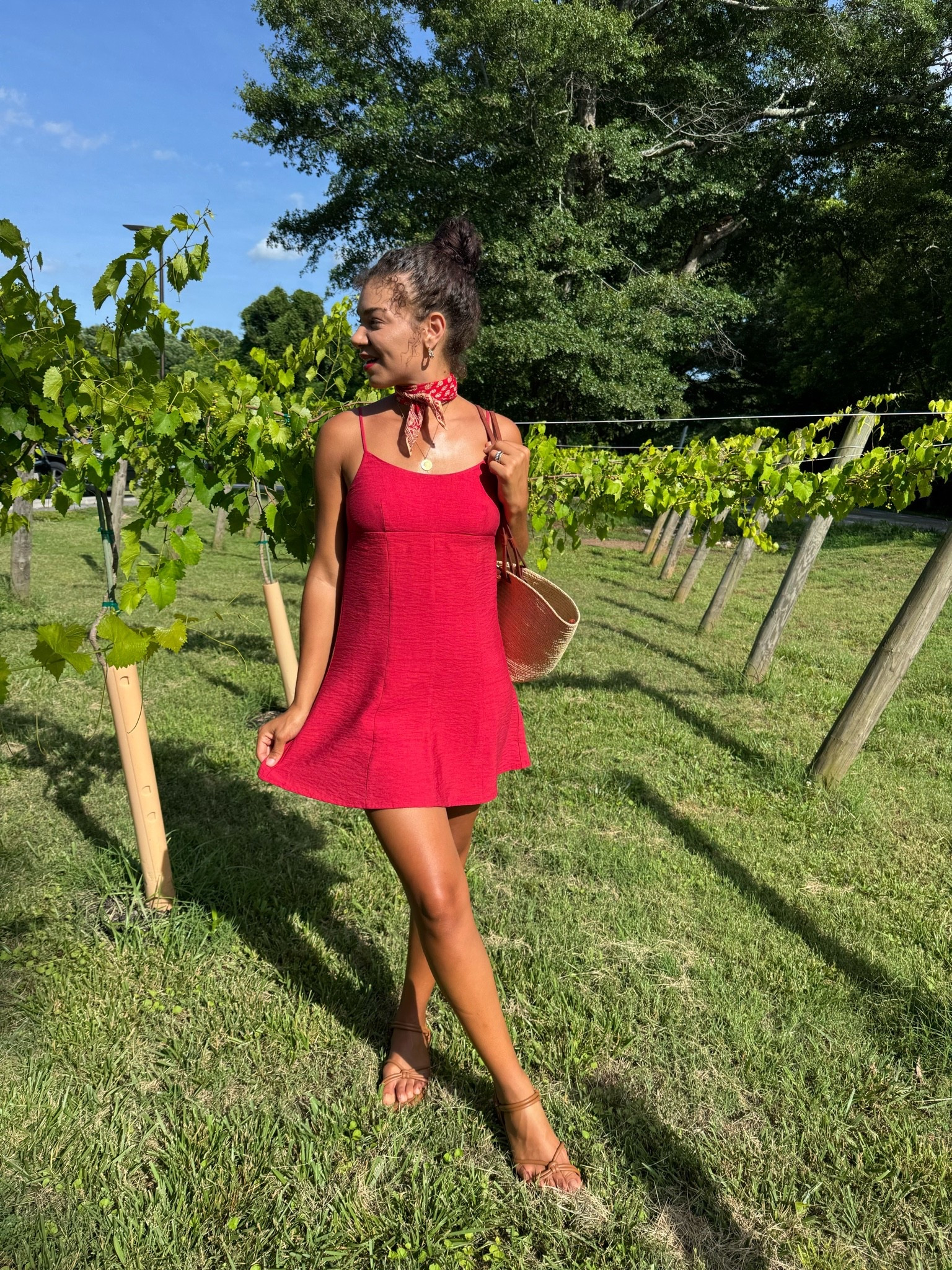 Summer winery outfit: red dress, straw bag, sandals, and a cotton red scarf

#LTKootd