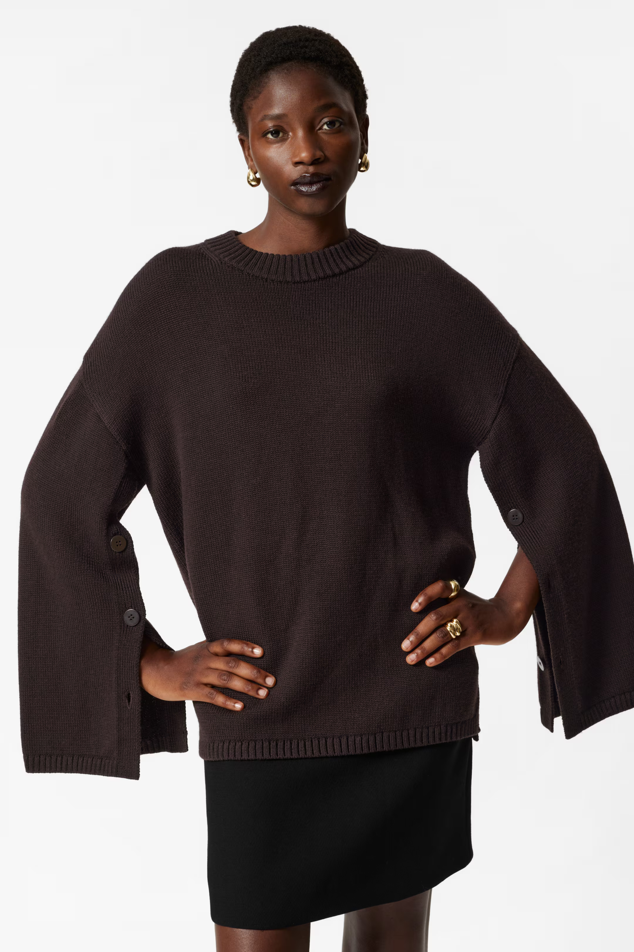 Pullover aus Merinowolle mit Knopfdetail | H&M (DE, AT, CH, NL, FI)