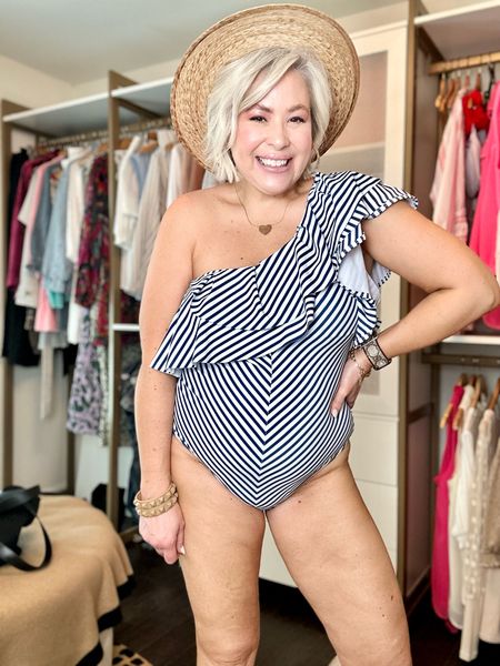 Swimsuit season is around the corner. I’ll love this swimsuit from Amazon I purchased two. It’s a one shoulder, ruffle, striped swimsuit fits true to size wearing a large.

#LTKFind #LTKswim #LTKSeasonal