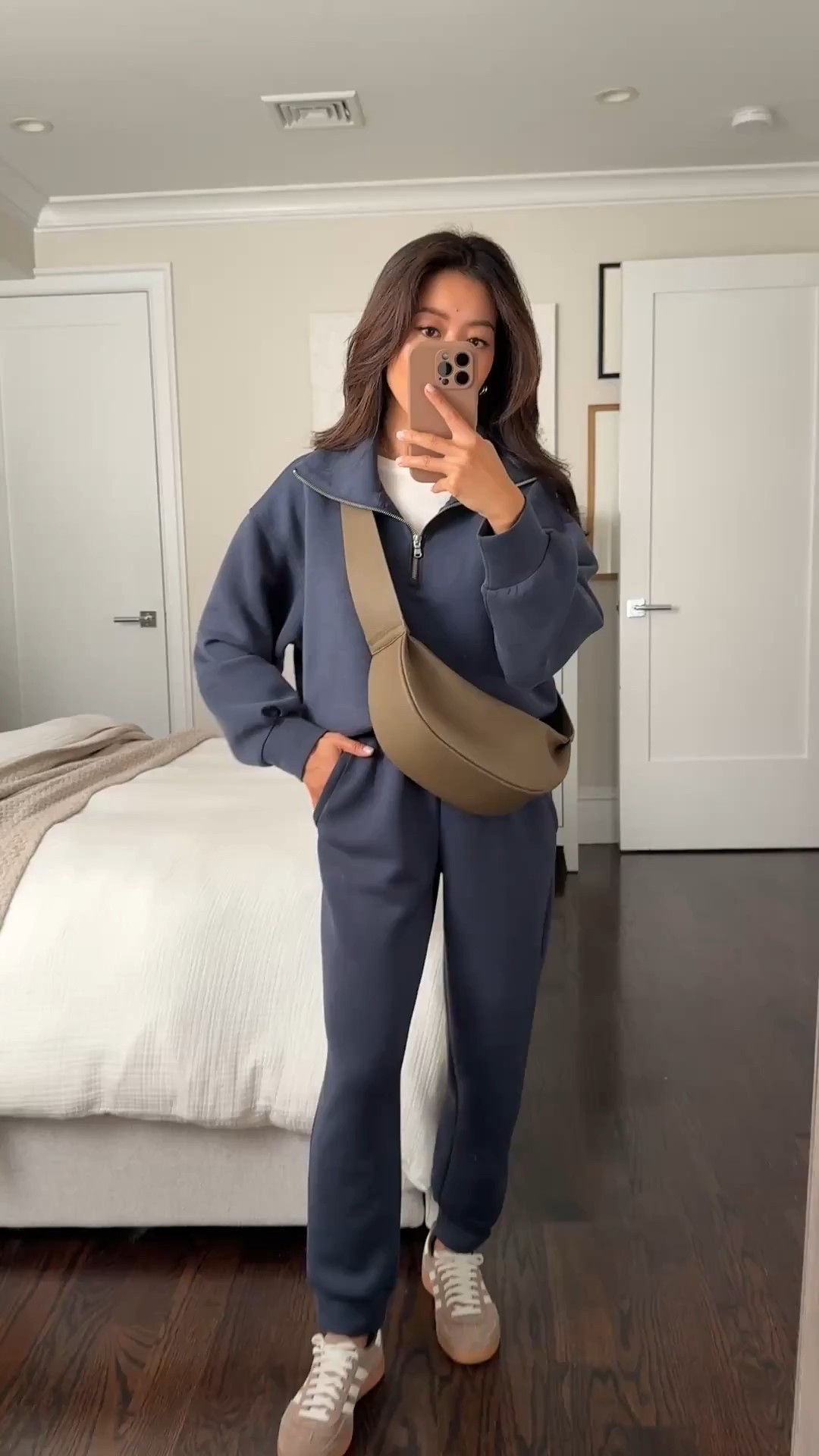 On sale: Old Navy joggers are fully restocked in petite sizes in navy!

I wash these inside out in cold water and air dry to minimize pilling

• High-waisted jogger sweatpants in navy size xs petite, I’ve also worn with the brown loafers linked to elevate the look

• old navy half-zip pullover sweatshirt in navy xs petite

• Everlane staple white tee xs (Sized up)

• Adidas handball sneakers 5 - comfy style with support, runs big 

I can also fit kids size 3.5 = women’s 5

• Amazon pebbled leather crossbody bag nice quality 

Travel outfit, matching sets, petite friendly athleisure, school drop off, easy mom style

#LTKTravel #LTKPetite #LTKmomlife